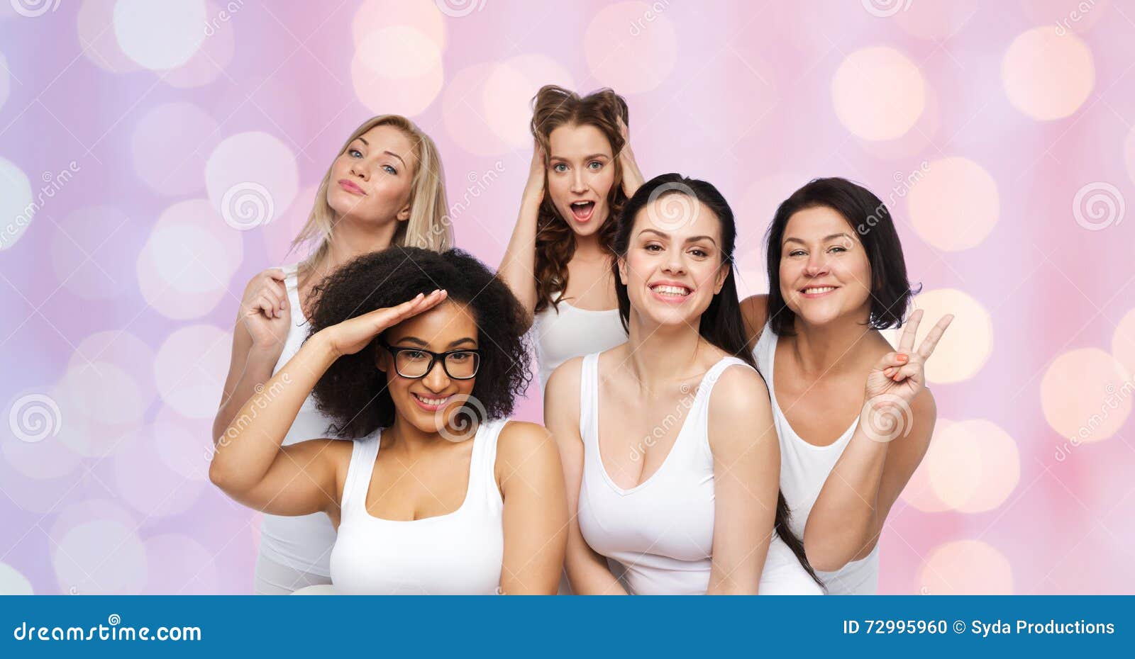 Group of Happy Women in White Underwear Having Fun Stock Photo