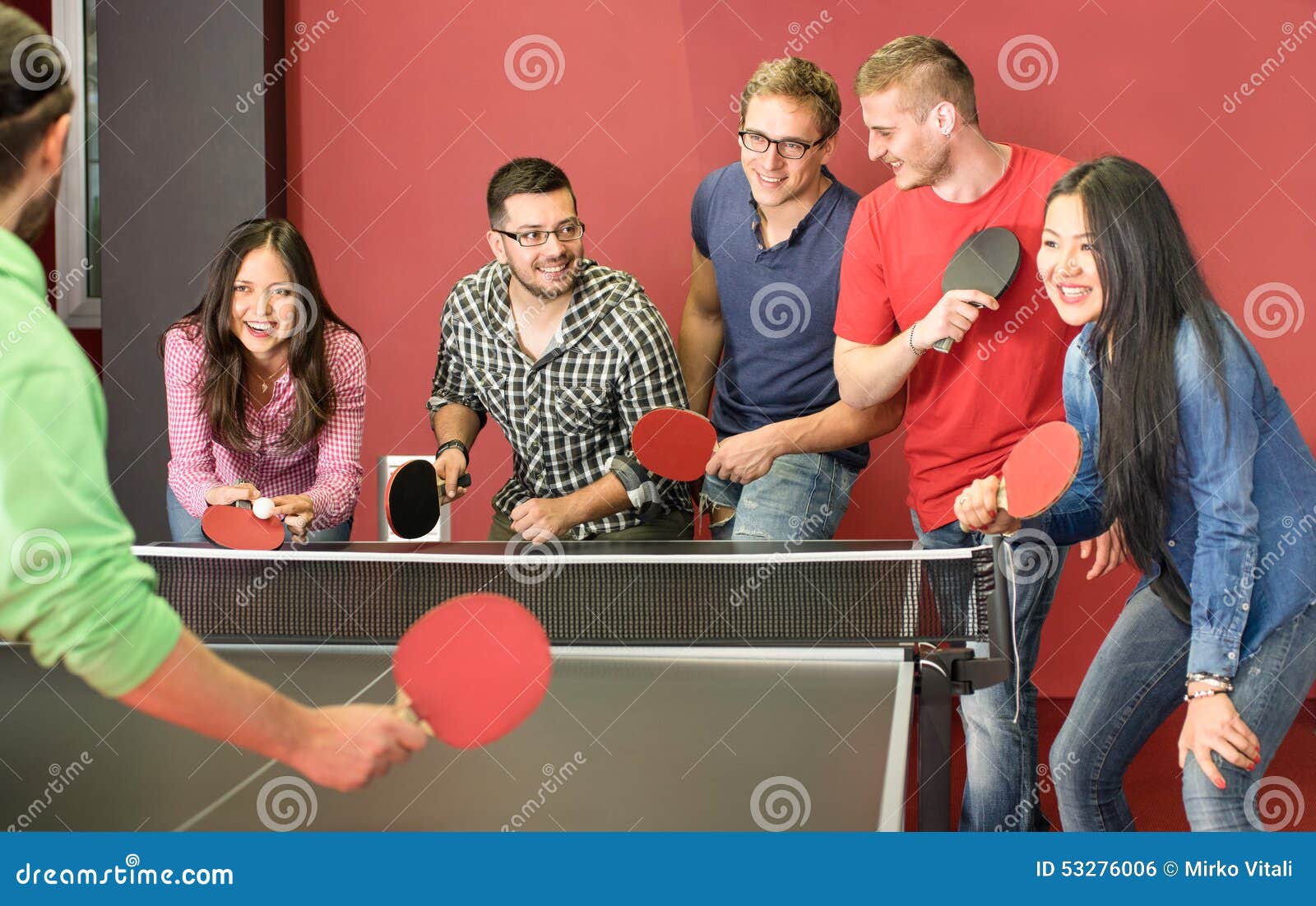 Group Of Happy Young Friends Playing Ping Pong Table ...