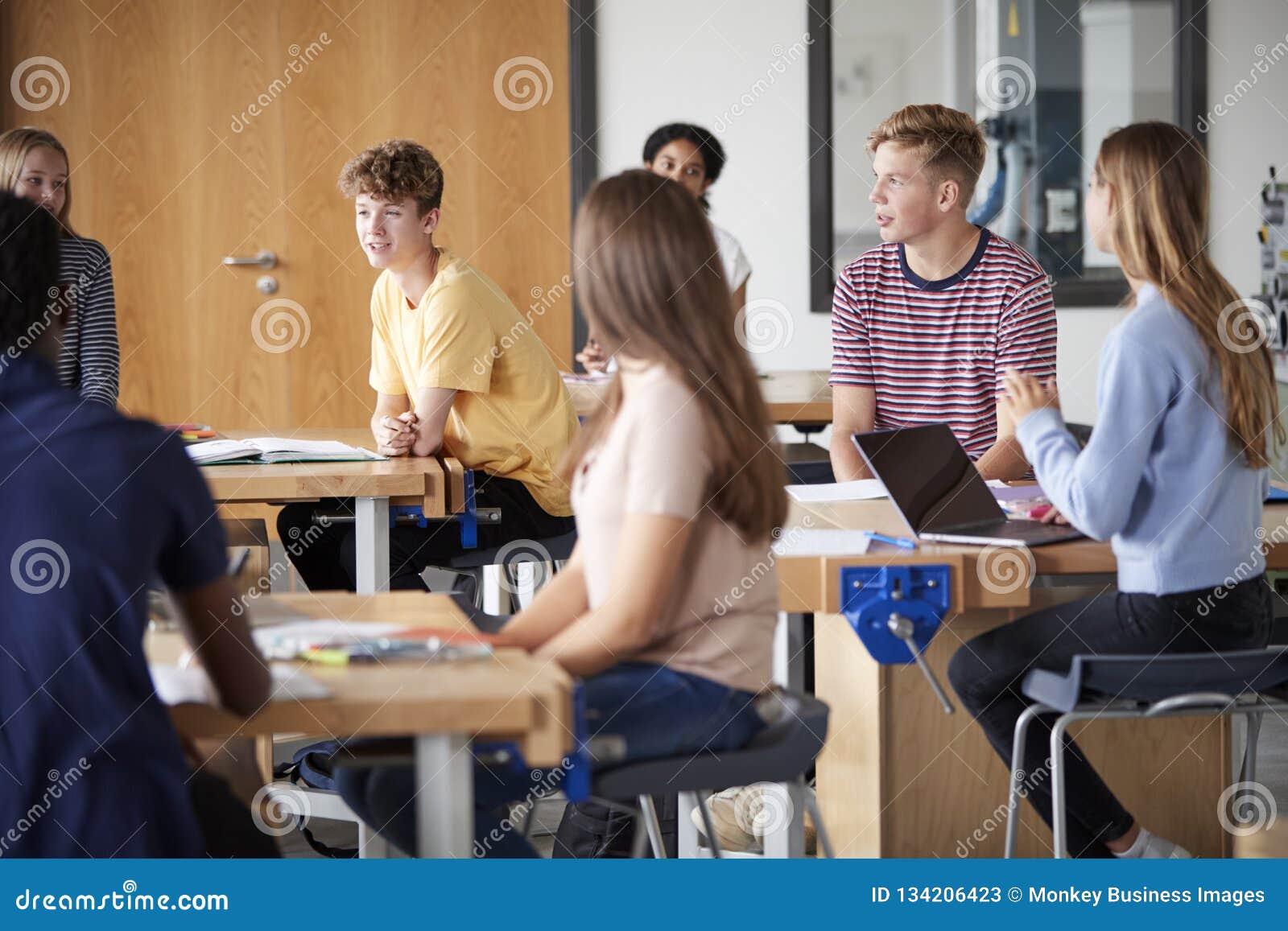 Group of High School Students Sitting at Work Benches Having Discussion in  Design and Technology Lesson Stock Image - Image of college, carpentry:  134206423
