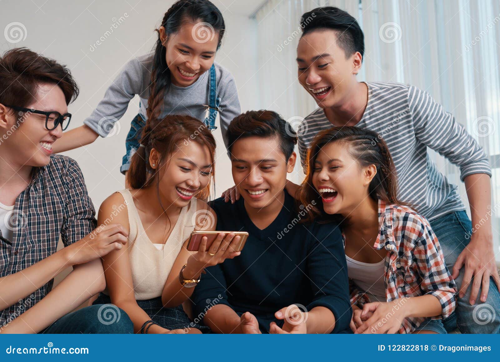 Young People Watching Funny Videos Stock Photo - Image of party, funny: 122822818 Young People Watching Funny Videos Stock Photo - Image of party, funny: 122822818