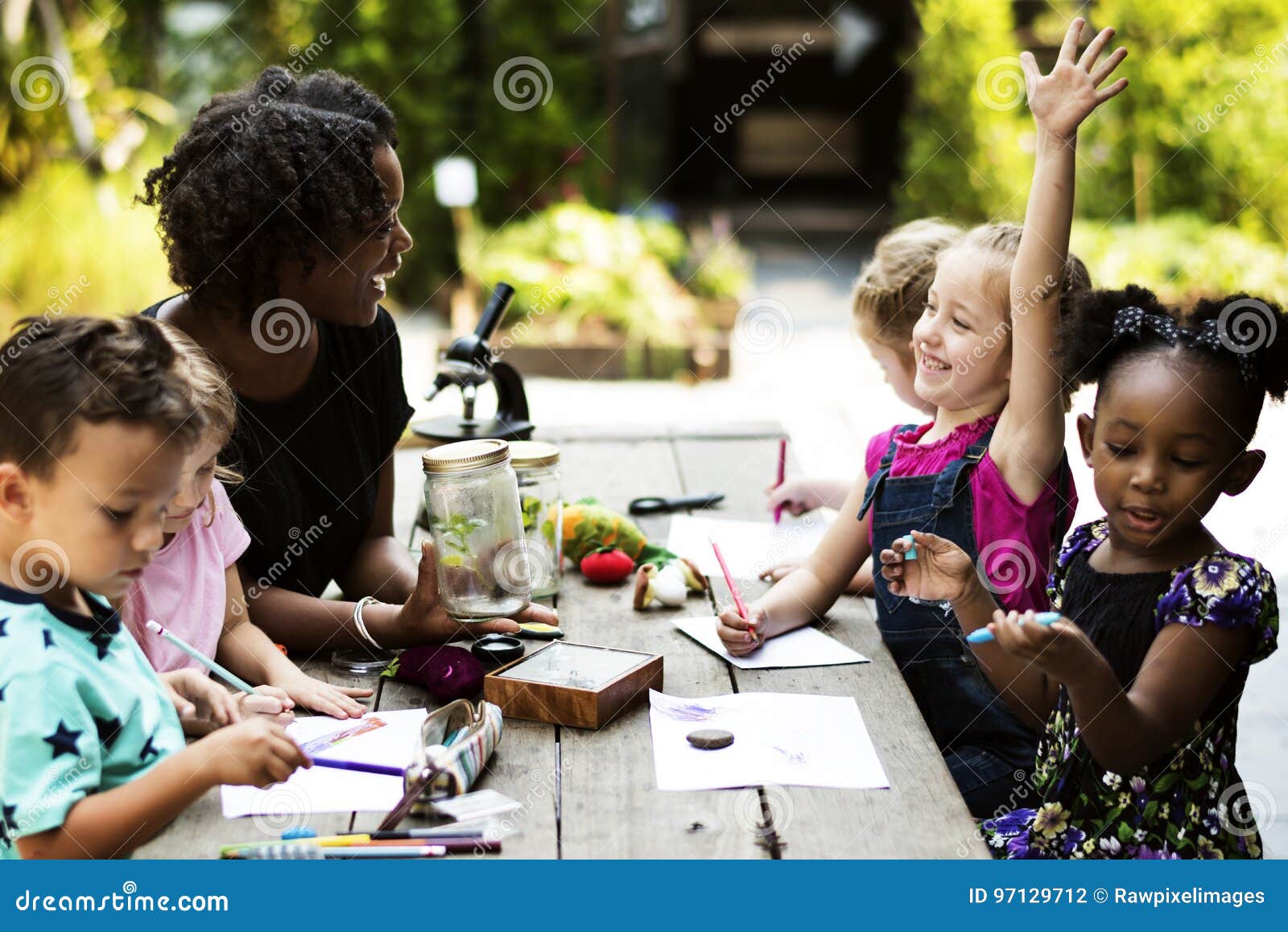 group of kids classmates learning biology drawing class