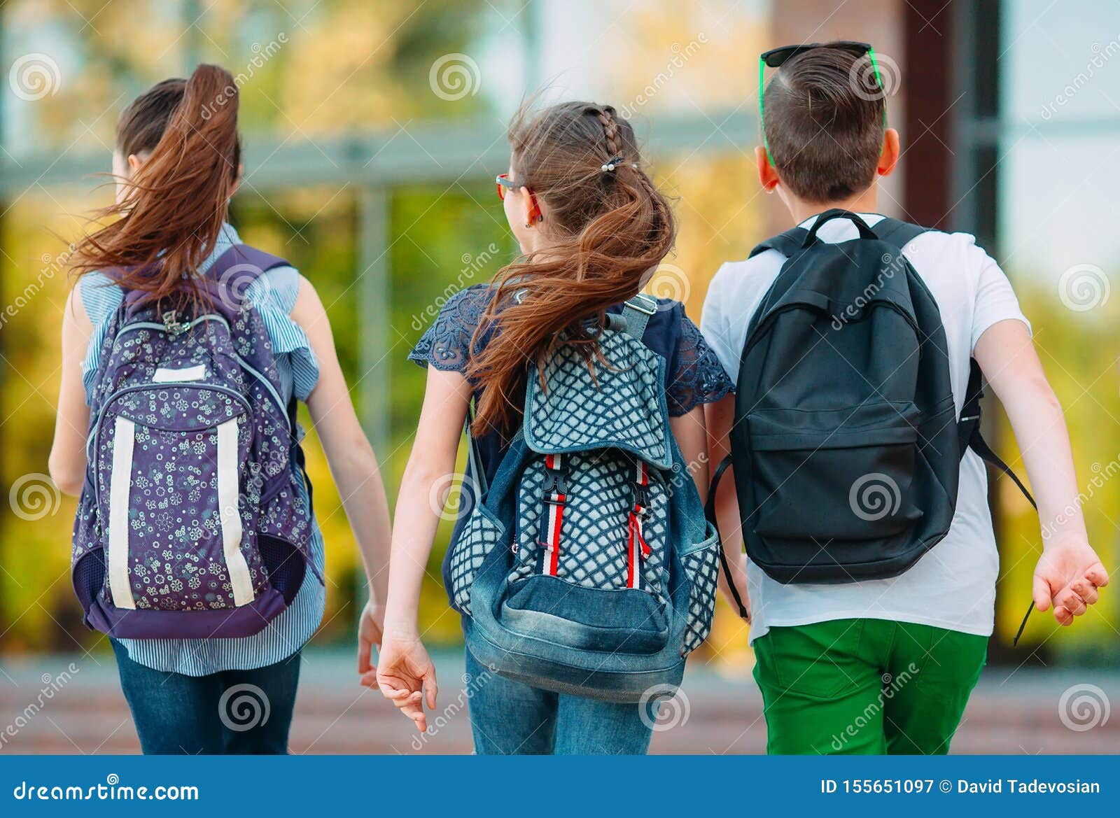 group of kids going to school together.