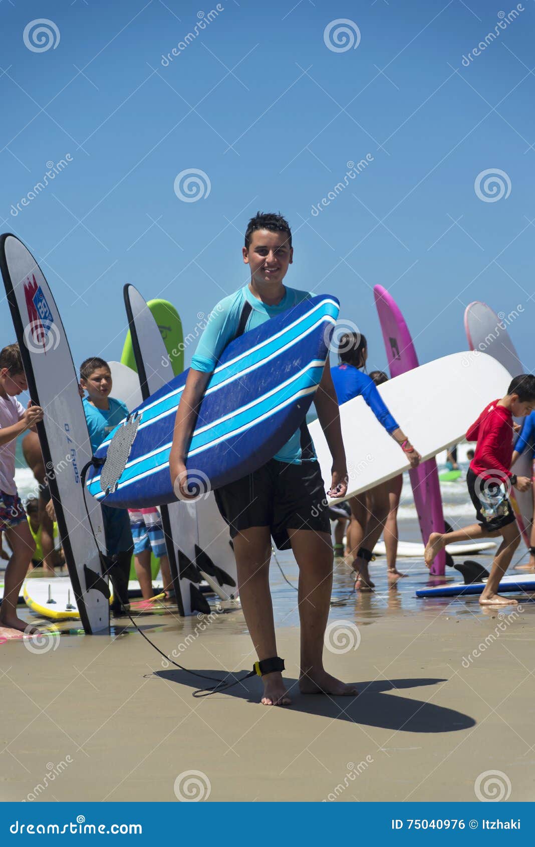 Group of Kids Holding Surfboard on the Beach Editorial Photo - Image of ...