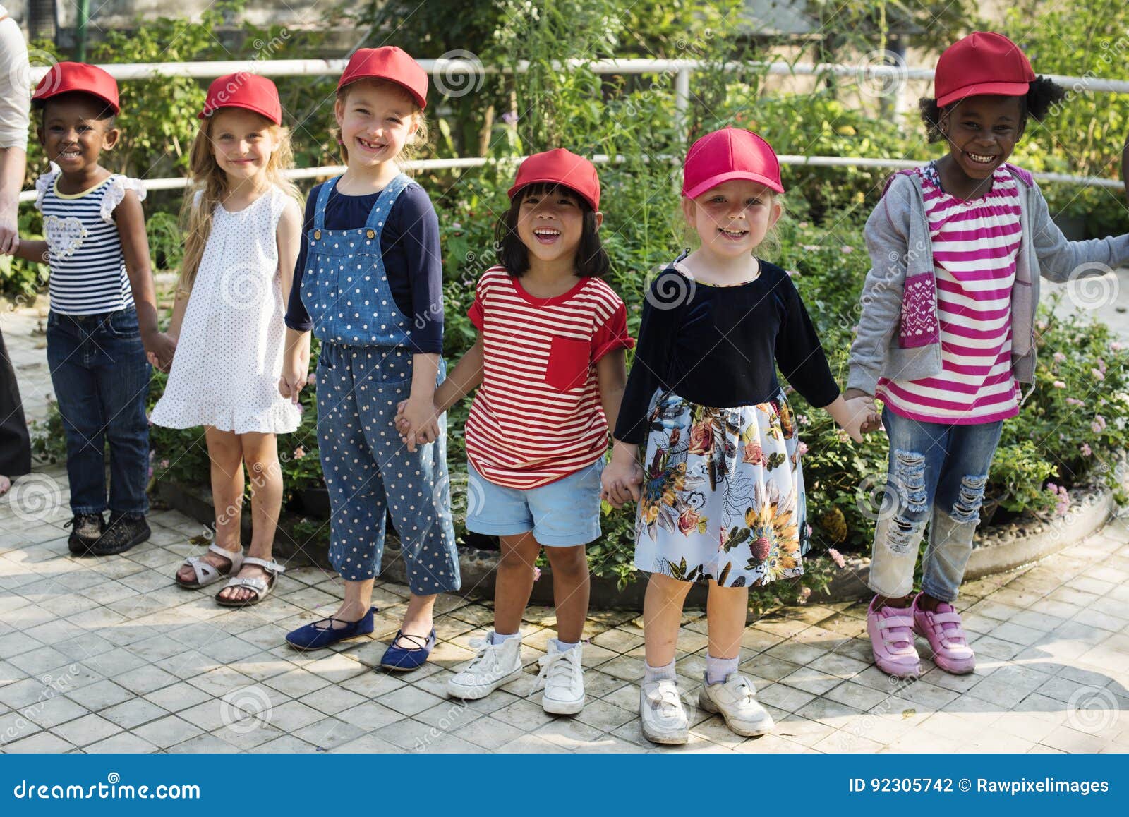 group of kids school field trips learning outdoors botanic park