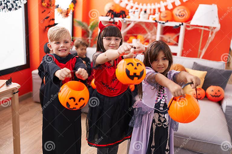 Group of Kids Wearing Halloween Costume Asking for Candies at Home ...