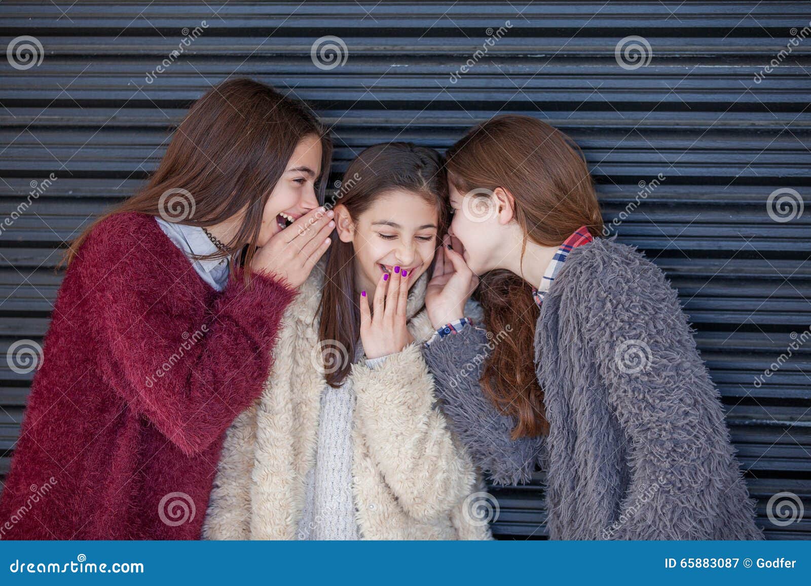 group kids whispering secrets