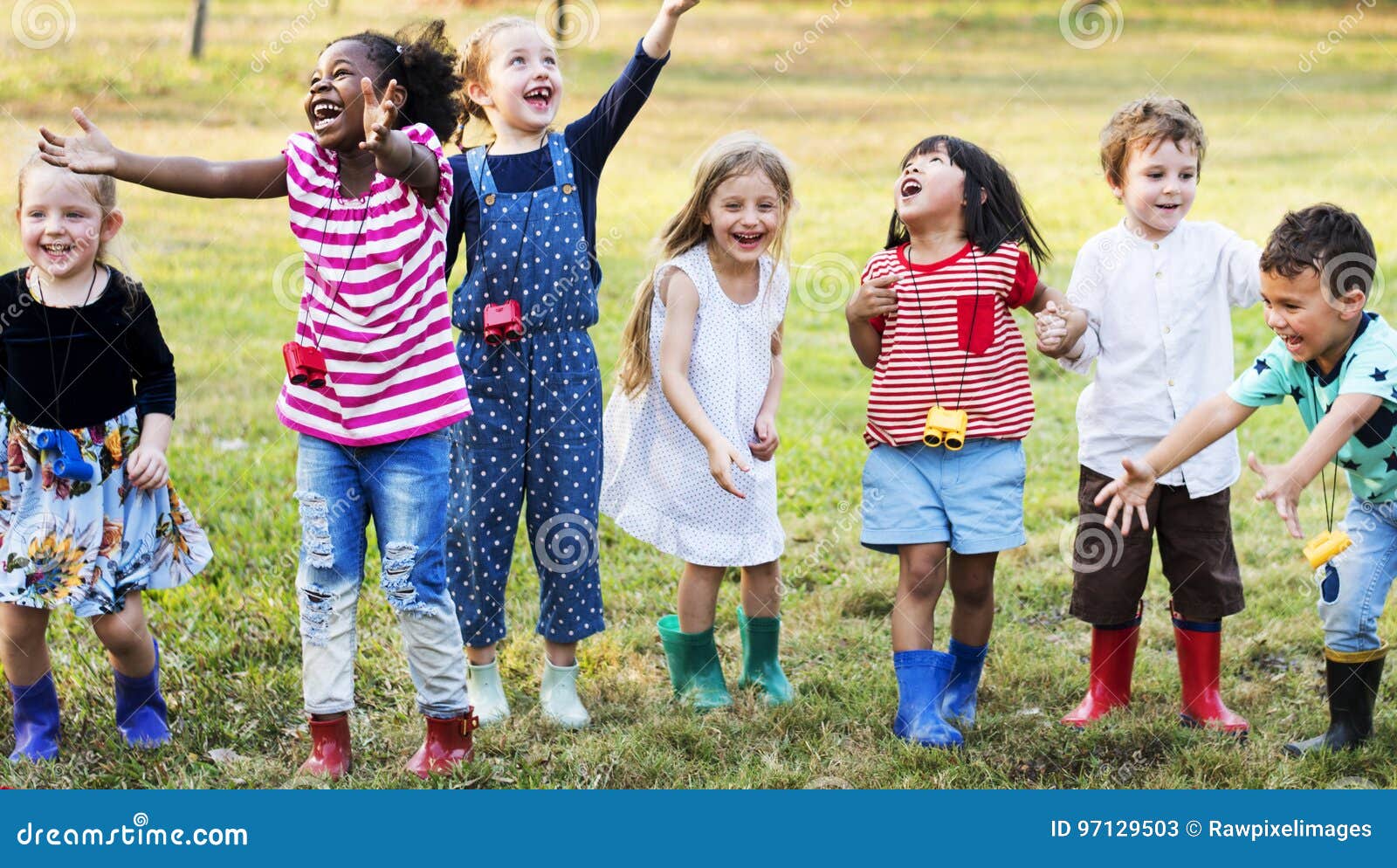 group of kindergarten kids learning gardening outdoors field trips