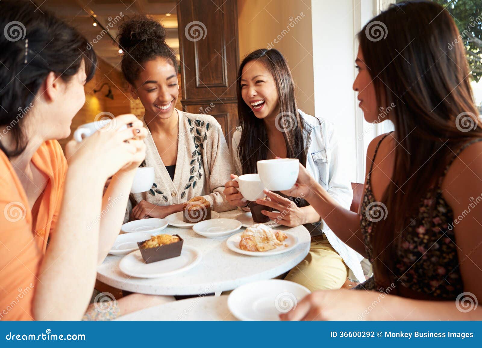 Two Male Friends Laughing In An Istanbul Cafe Stock Photo