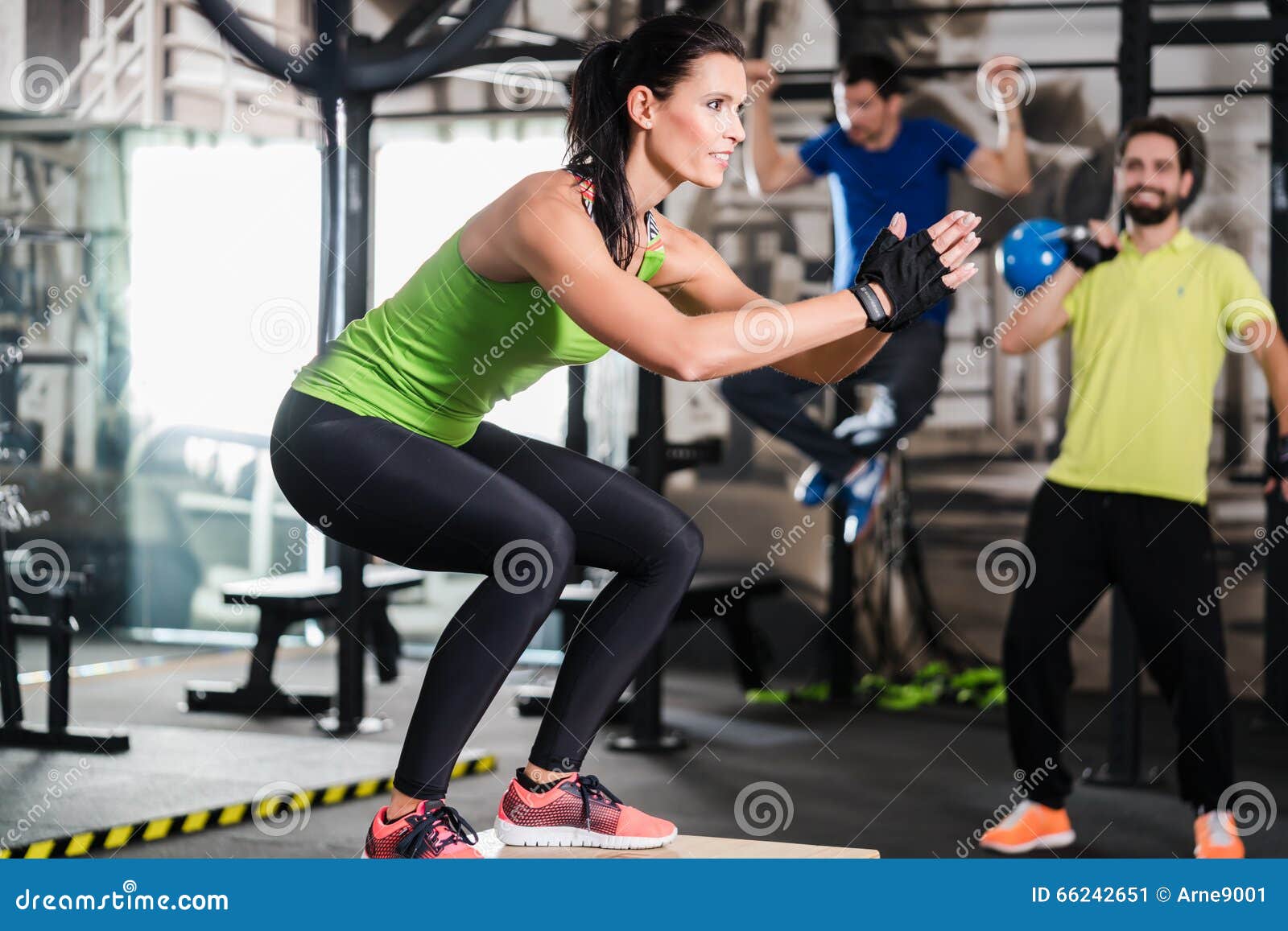 group of men and woman in functional training gym