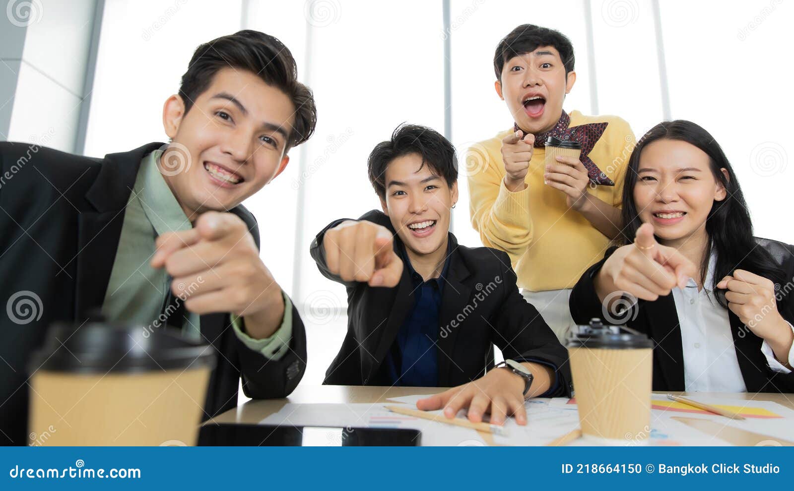 A Group of Multi-sex Colleagues Businesspeople Working Together in Teleconference Online Zoom Meeting, Looking To Webcam Camera Stock Photo