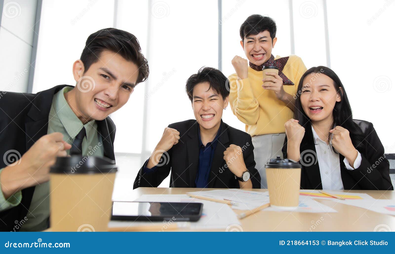 A Group of Multi-sex Colleagues Businesspeople Working Together in Teleconference Online Zoom Meeting, Looking To Webcam Camera Stock Image