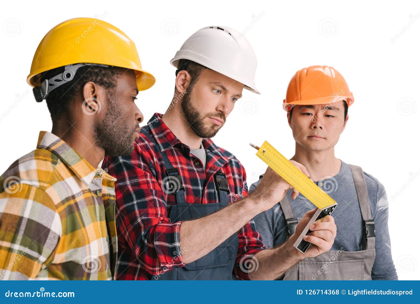 Group of Multiethnic Construction Workers Looking Stock Photo Image