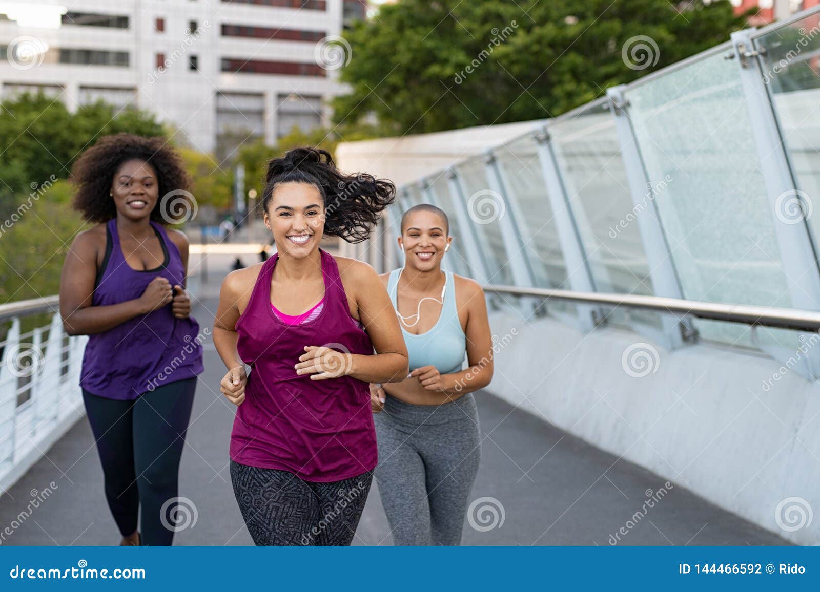 group of natural women jogging