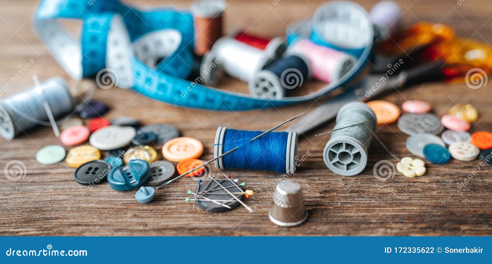 Group Of Objects About Sewing Equipment Set On A Wooden Background ...