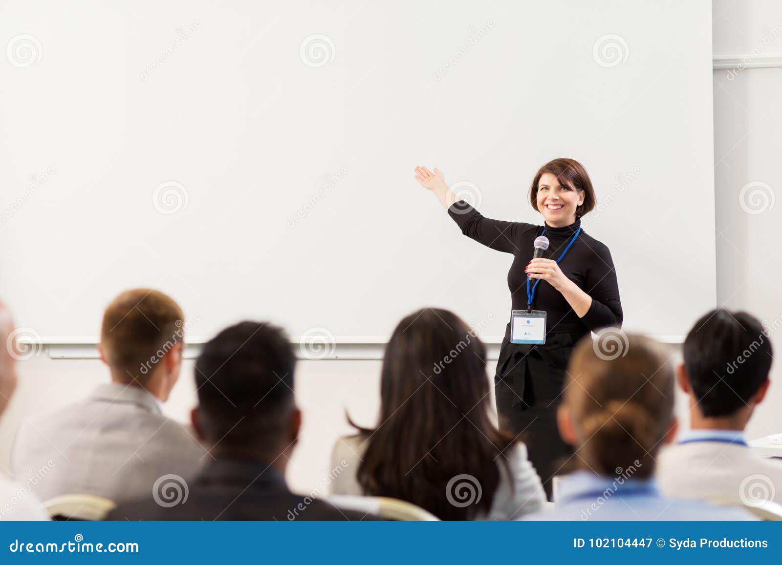 group of people at business conference or lecture