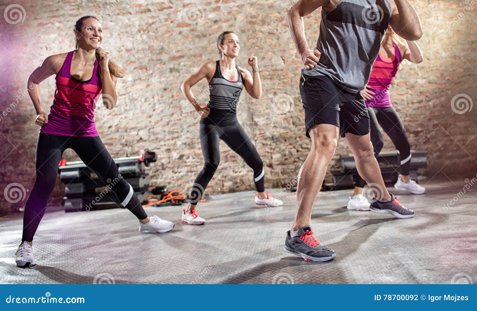 Group of People Doing Exercise with Music Stock Photo Image of health