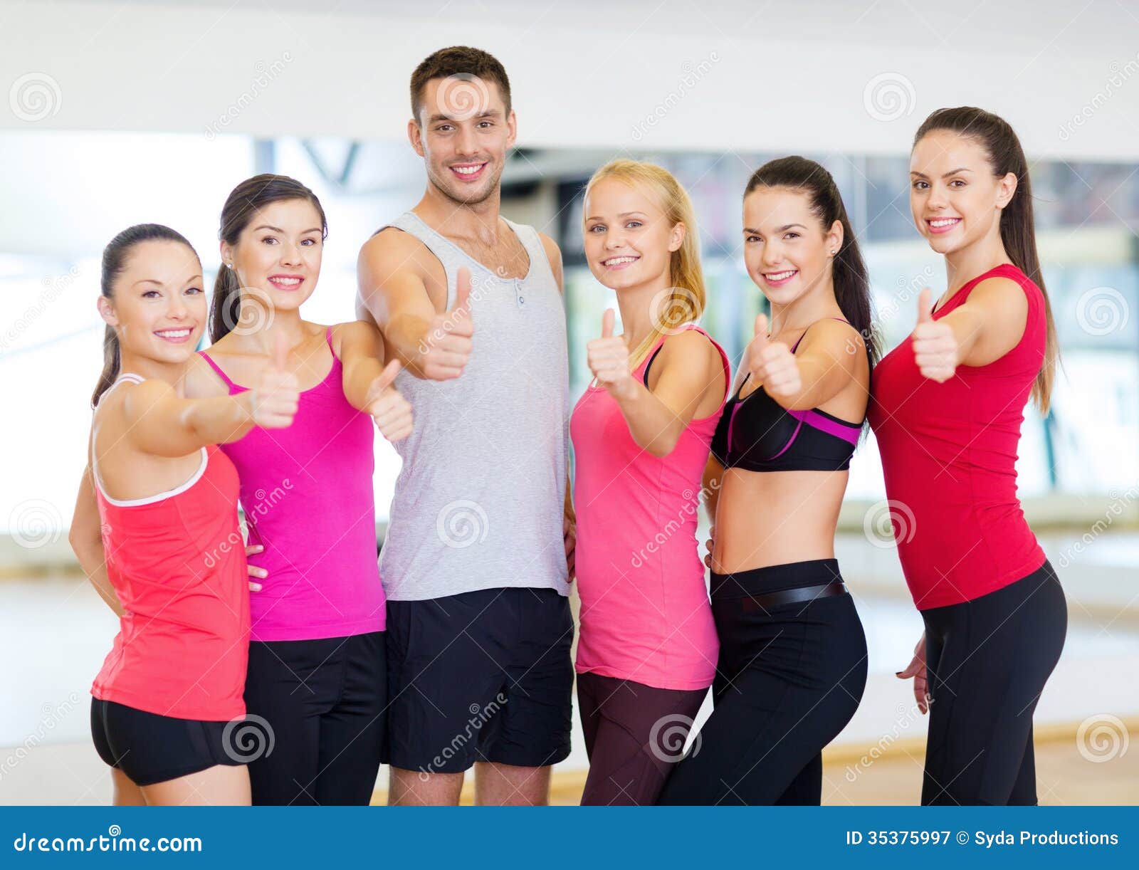 Group of People in the Gym Showing Thumbs Up Stock Image - Image