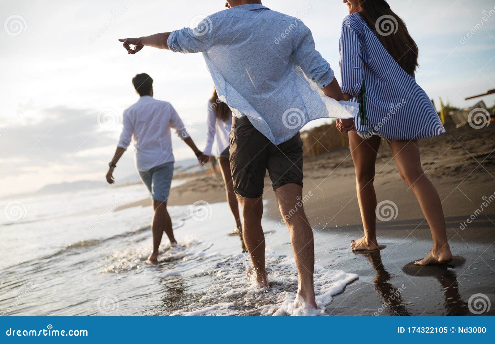 Group of People Running on Beach and Enjoying Summer Holiday Stock ...