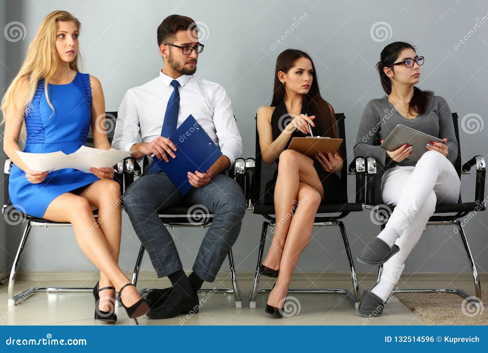 Group of People Sit on Casting Chairs Row Stock Photo Image of