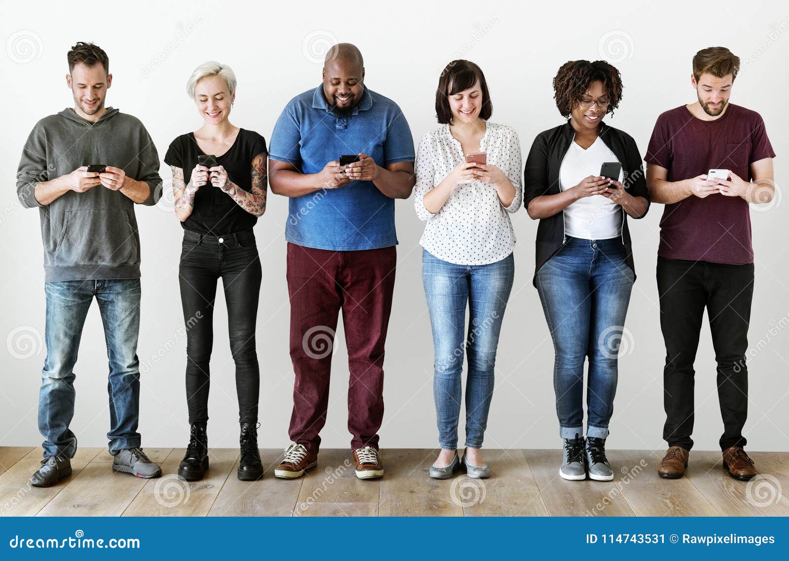 group of people using mobile phones