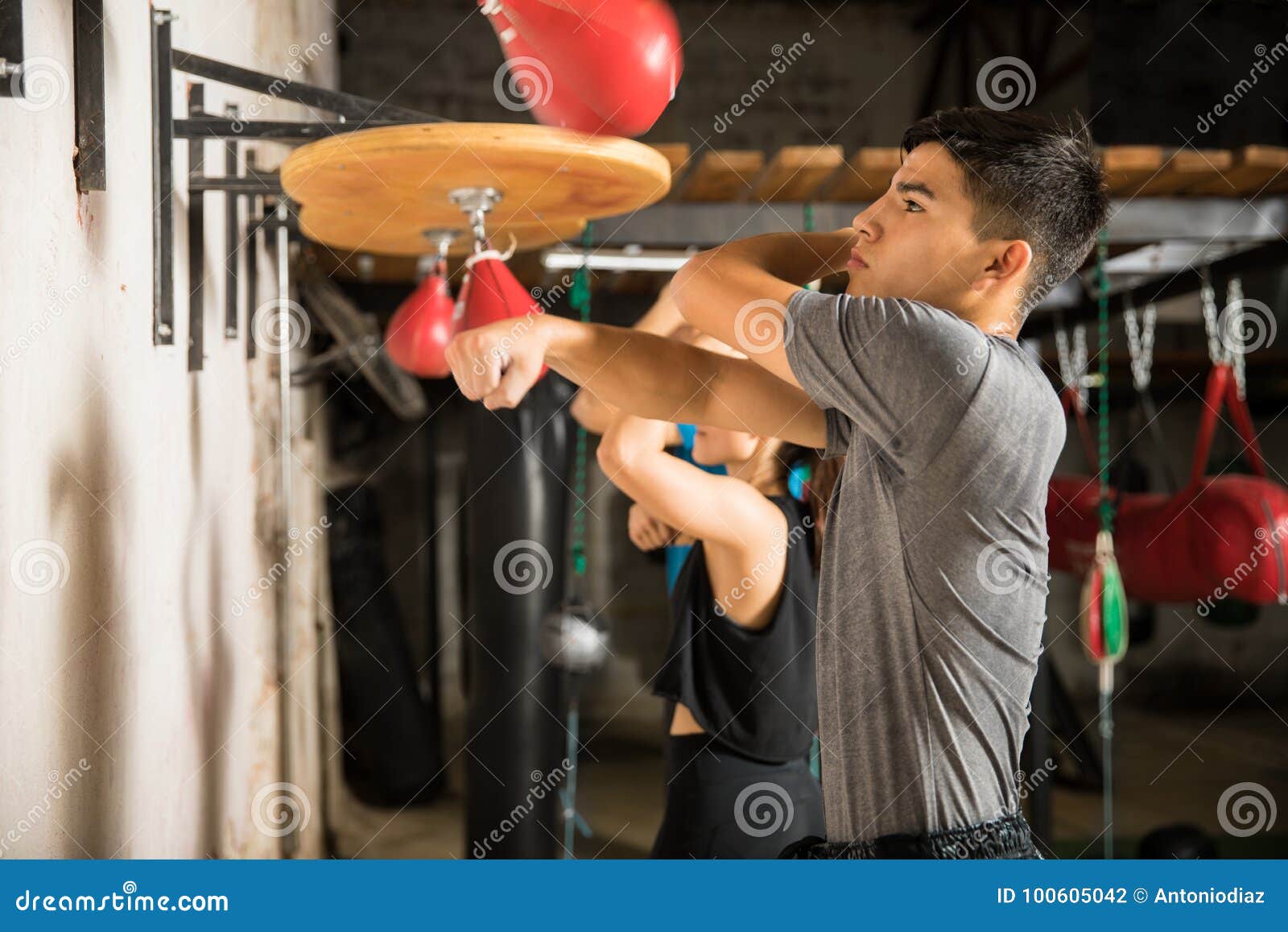 Group Of People Using Speed Bag Stock Photo - Image of sport, latin: 100605042