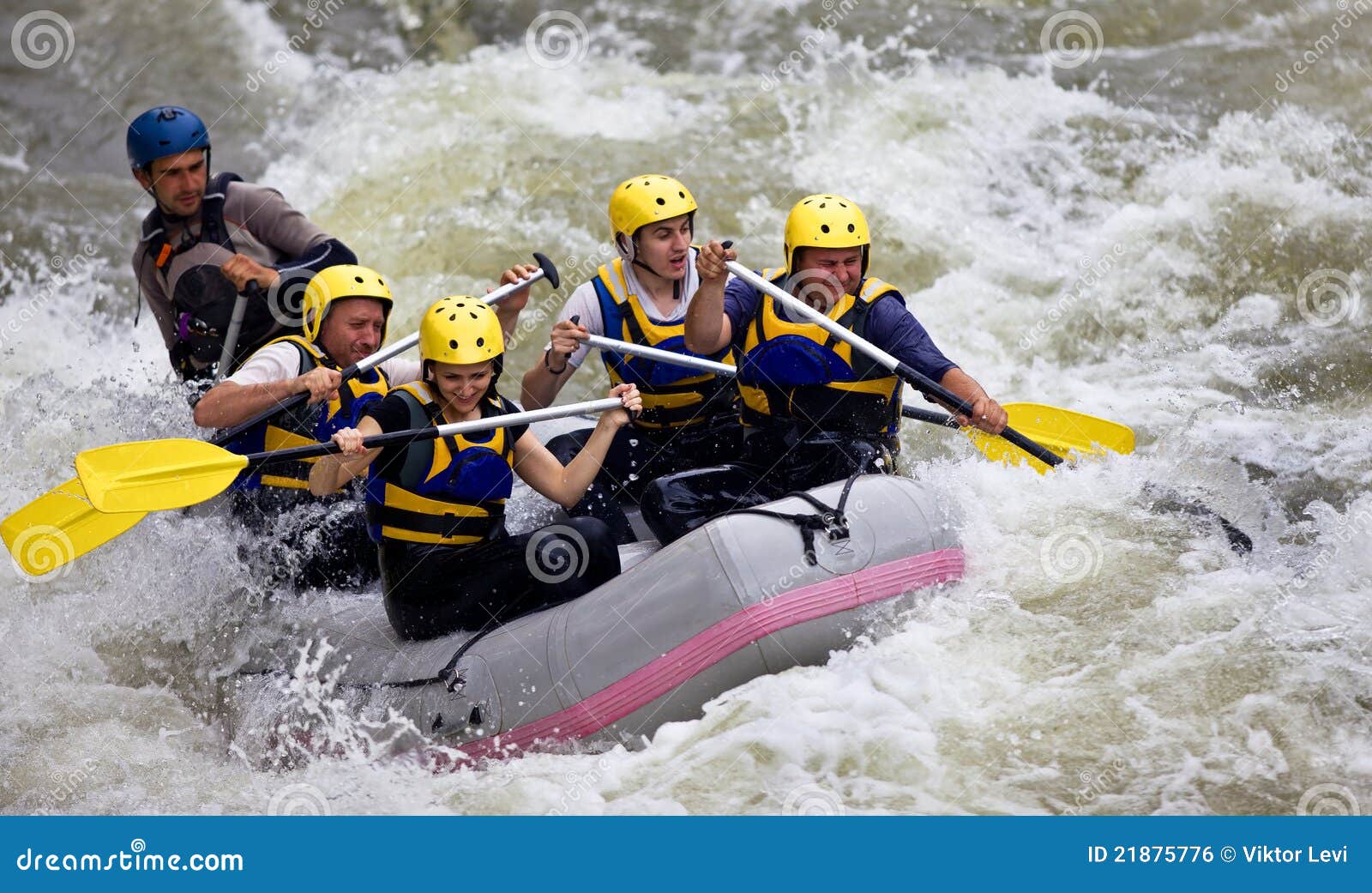 group of people whitewater rafting