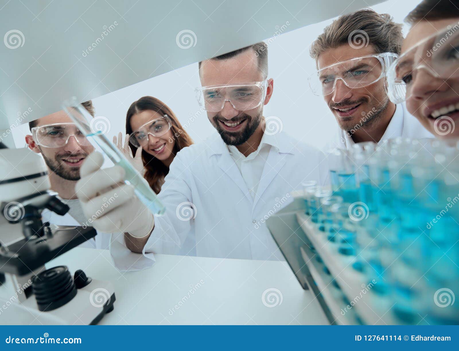 Group of Pharmacists Working in the Laboratory. Stock Photo Image of