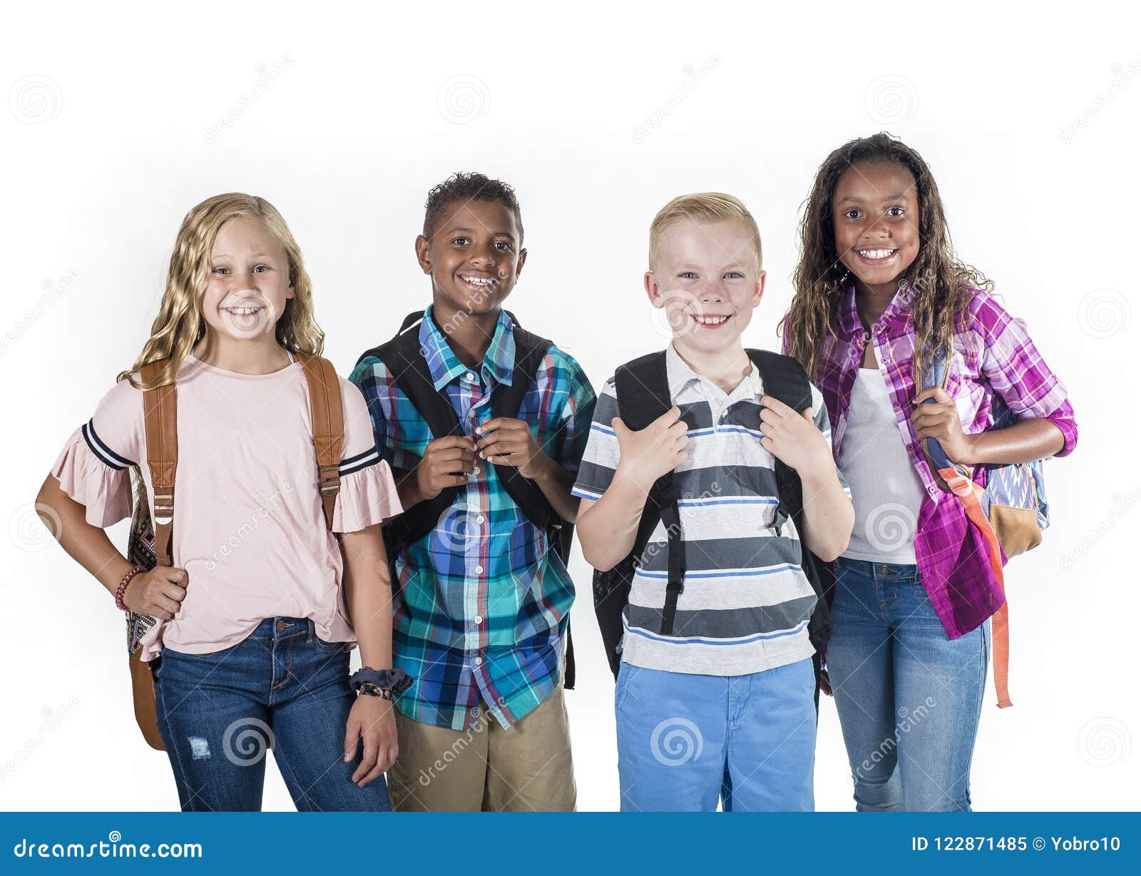 group portrait of pre-adolescent school kids smiling on a white background