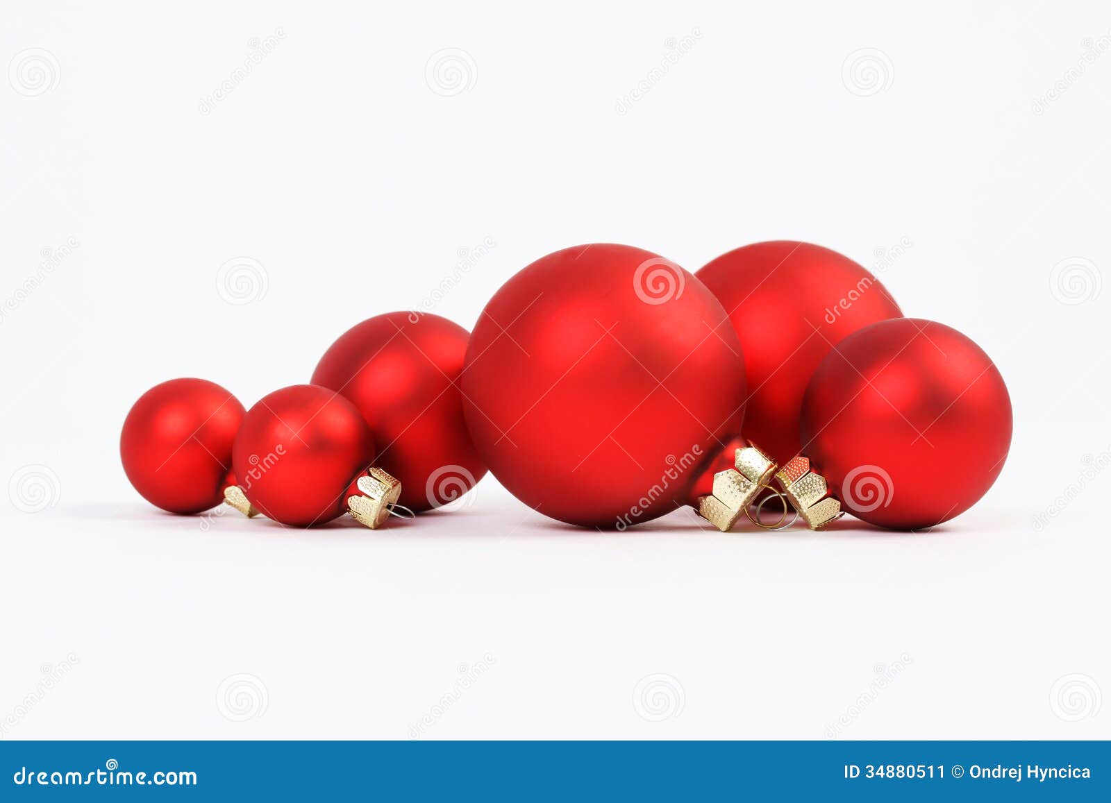 group of red matt christmas balls on white background