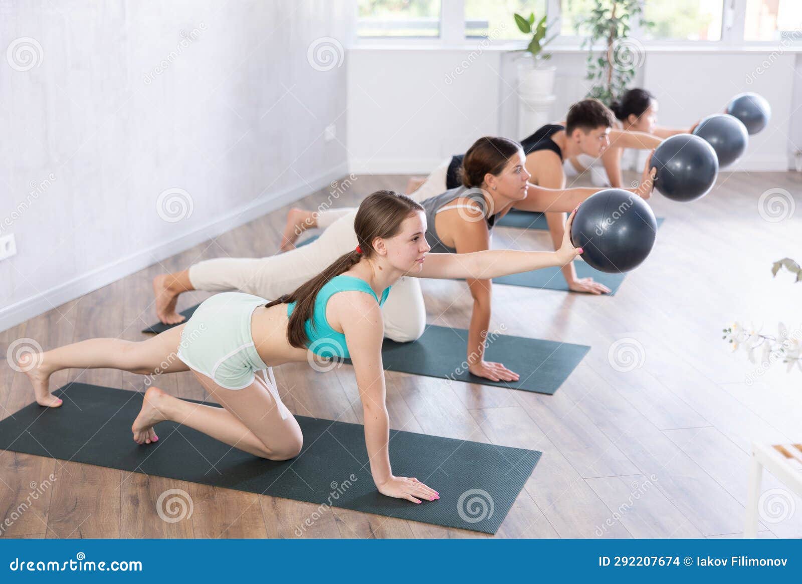 Group of Young People Doing Softball Pilates. Stock Photo - Image of  balanced, health: 292207674