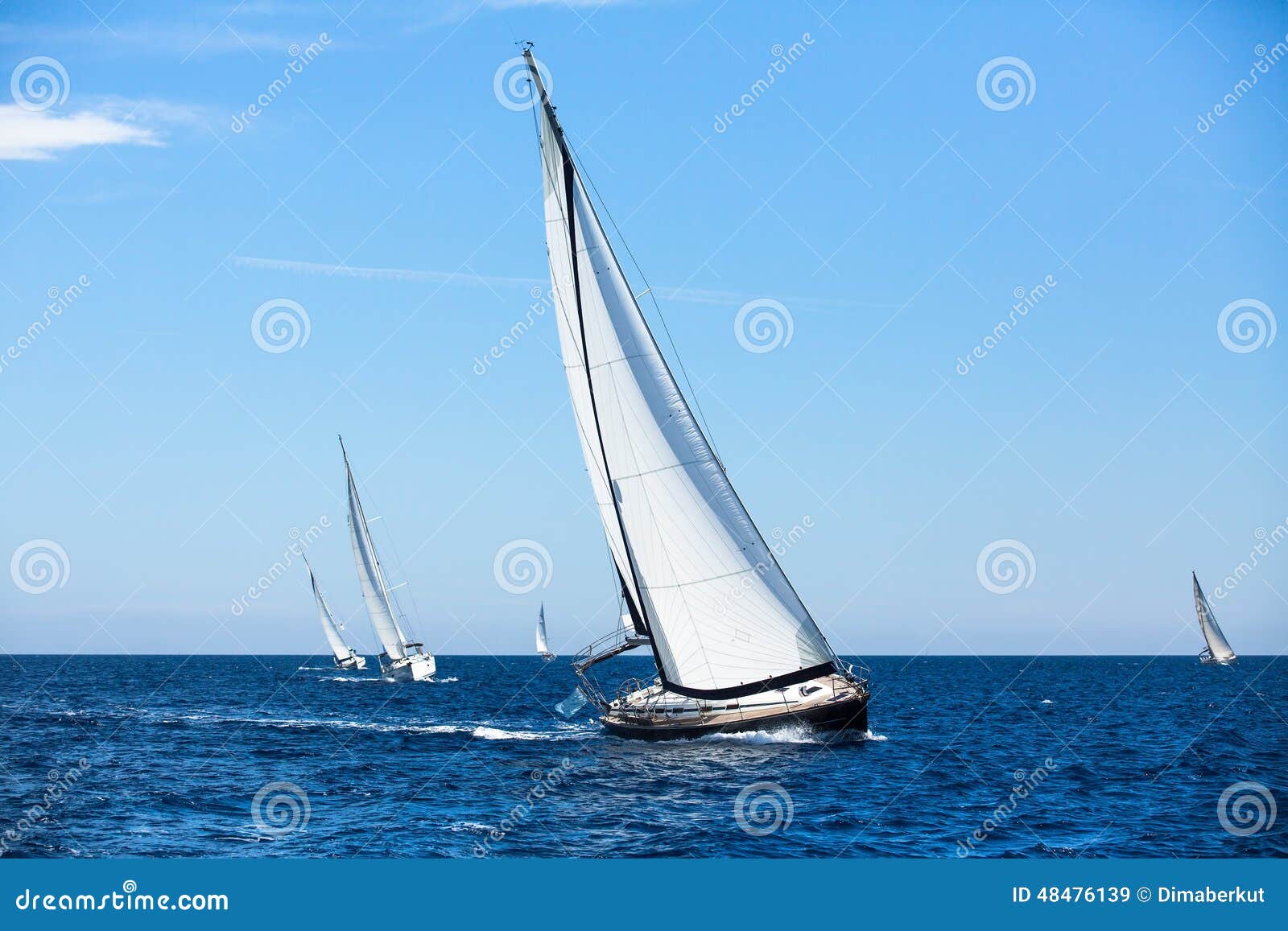 group of sail yachts in regatta in open the sea. boat in sailing regatta.