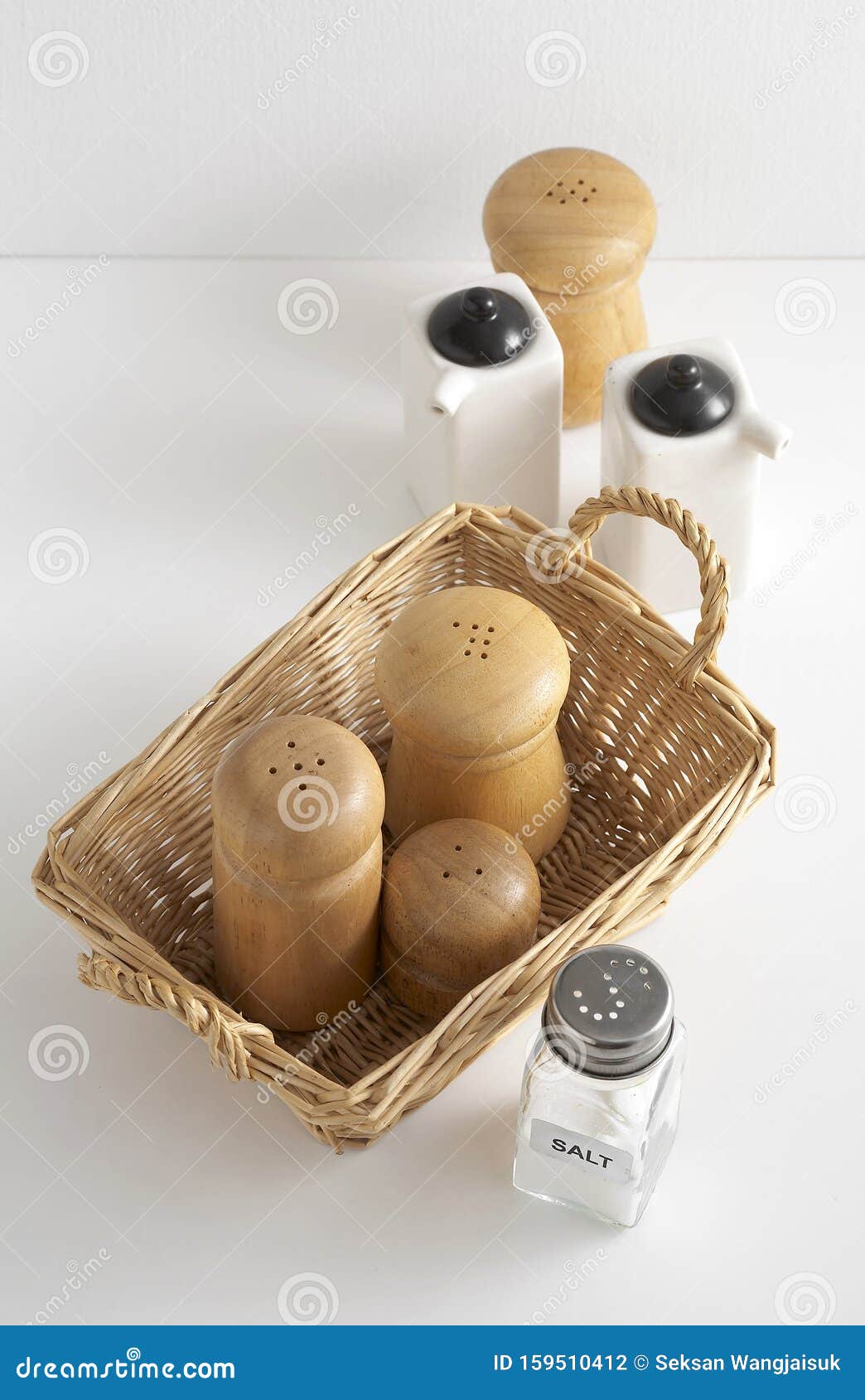 Group of Salt and Pepper Shaker on White Table Stock Photo Image of wood, containers 159510412