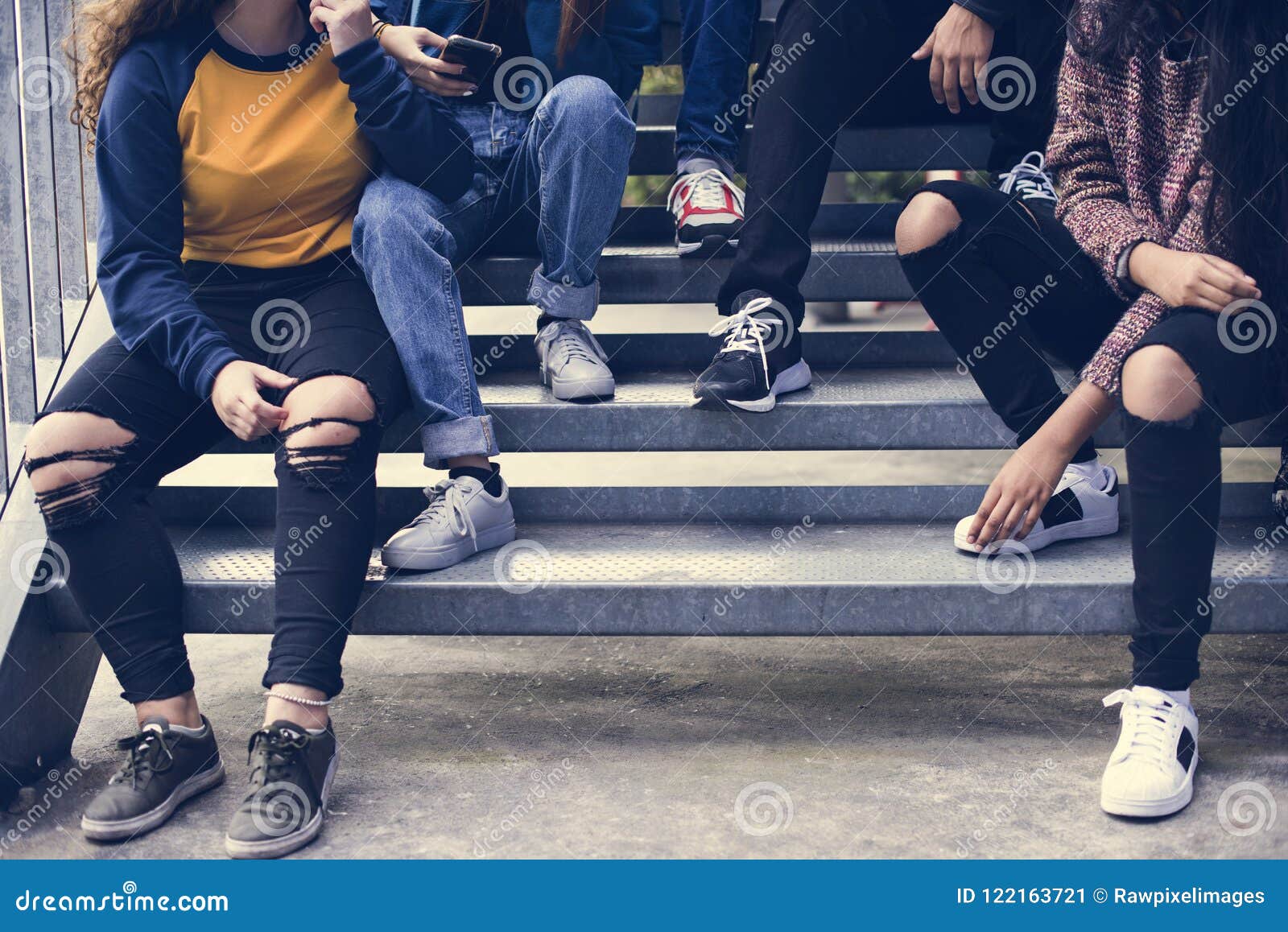 group of school friends outdoors lifestyle and after school hangout concept