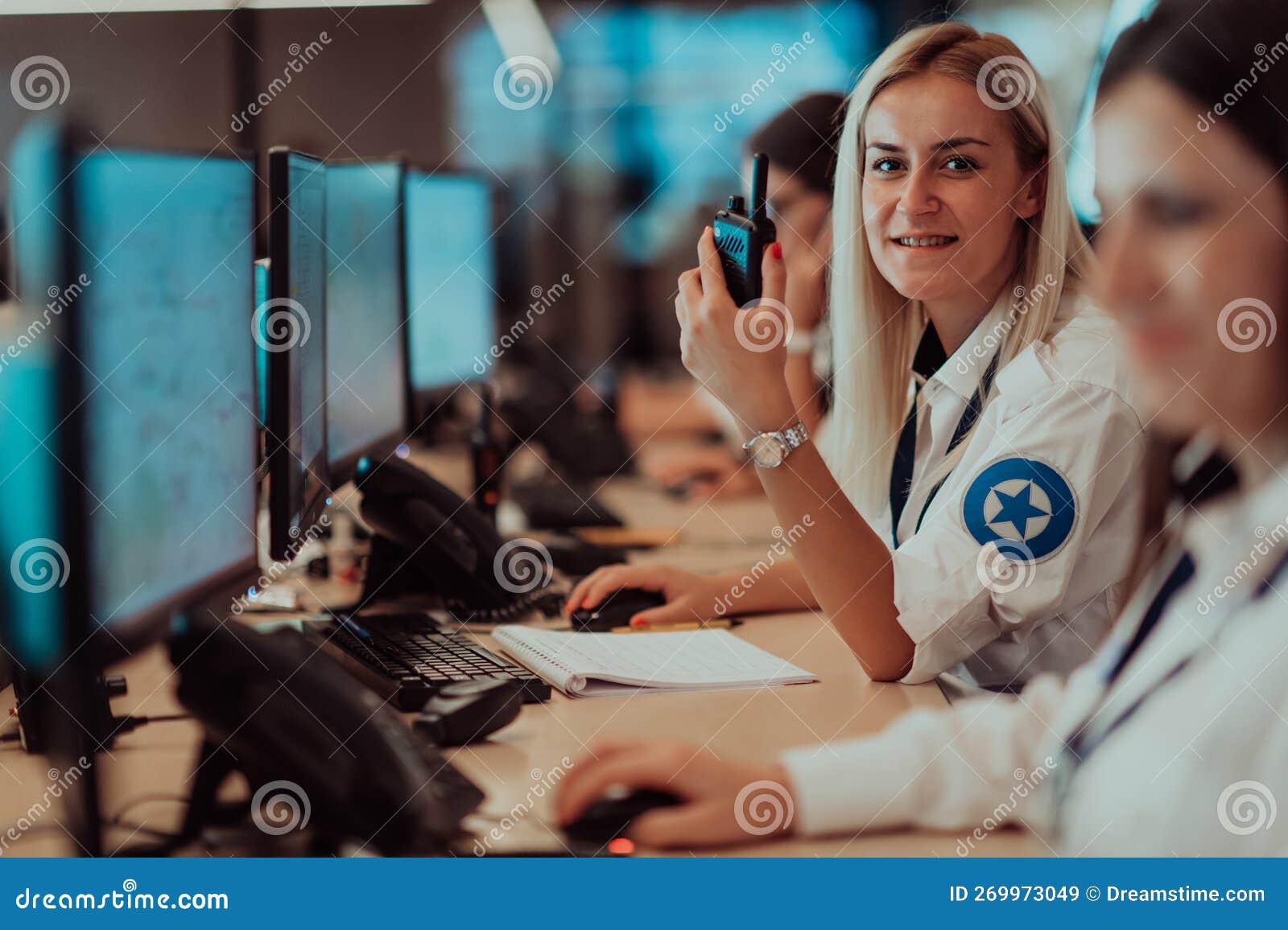 Group of Security Data Center Operators Working in a CCTV Monitoring