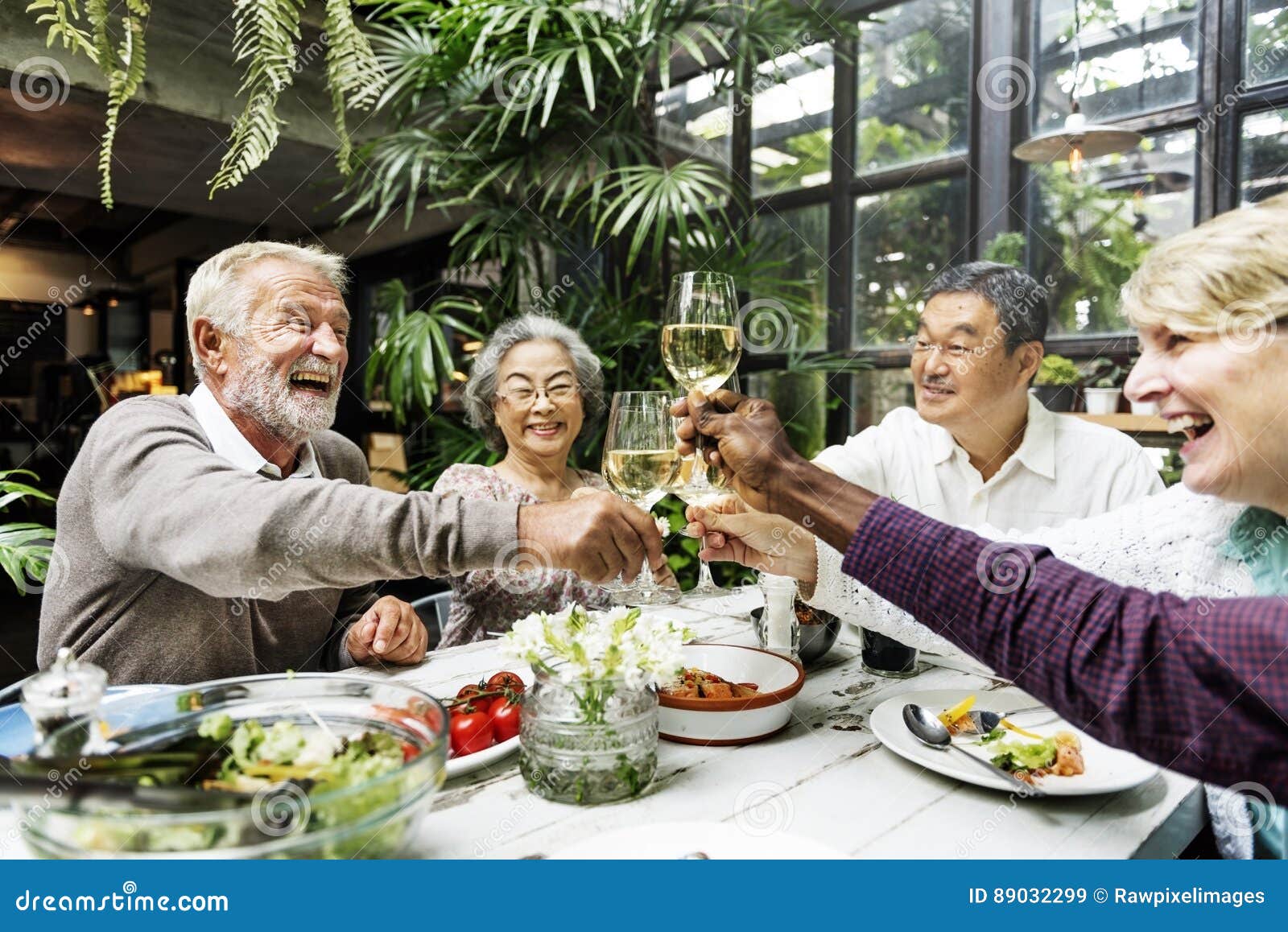 group of senior retirement meet up happiness concept