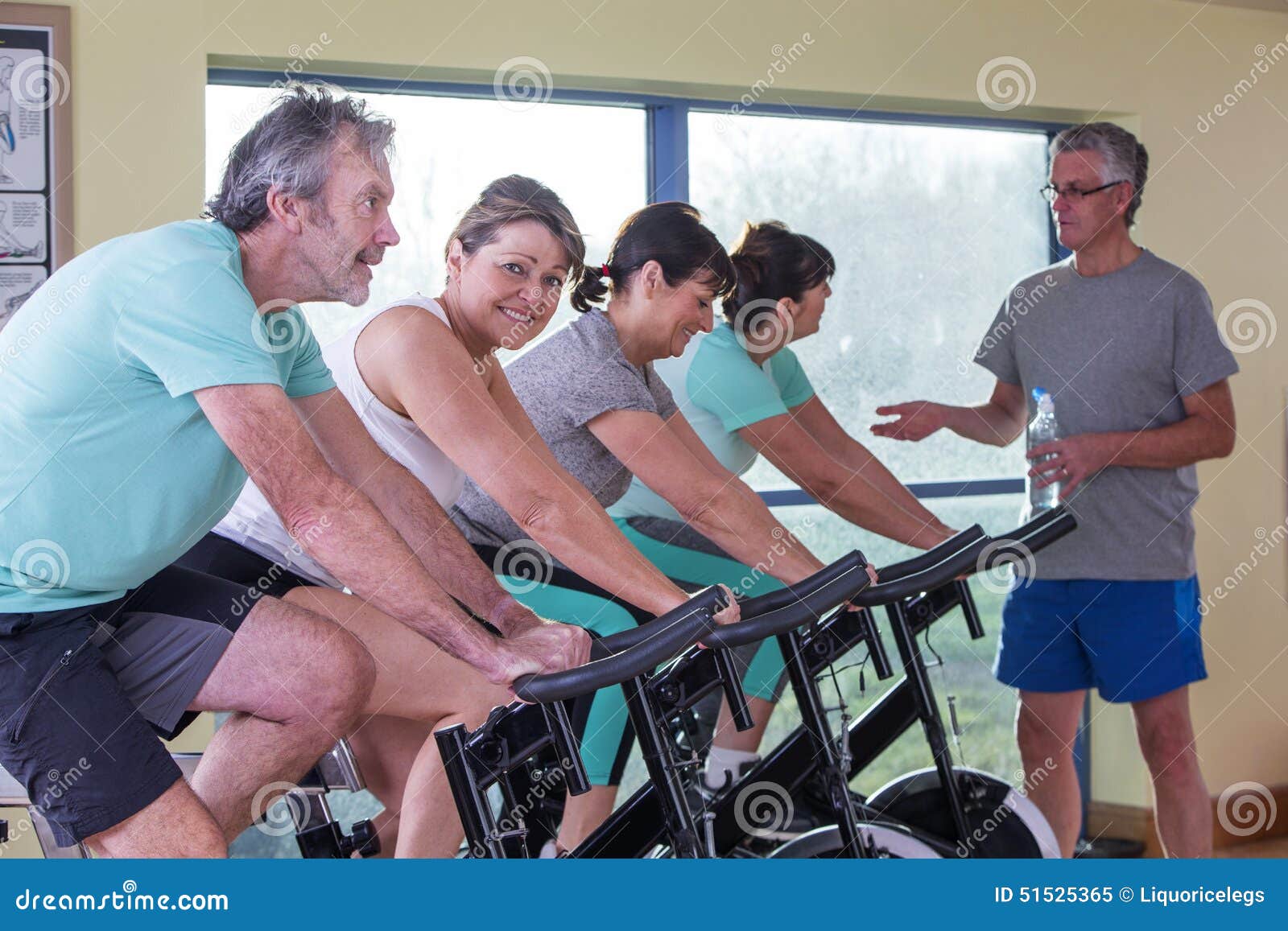 Group of Seniors Using Spinning Bikes Stock Image Image of fitness