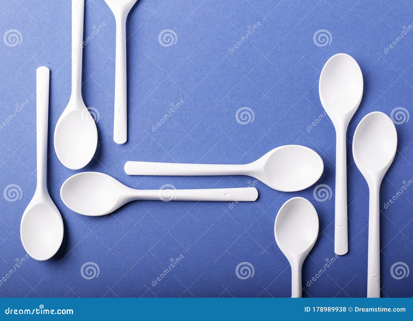 Group of Plastic Spoons on Blue Background Stock Photo Image of blue