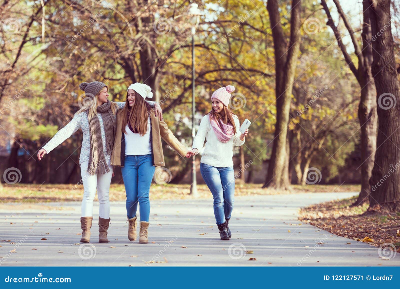 Group of Smiling College Girls Walking in the Park - Friendship Stock ...