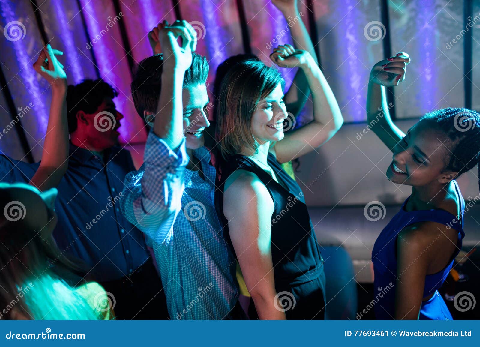 Group of Smiling Friends Dancing on Dance Floor Stock Image - Image of ...