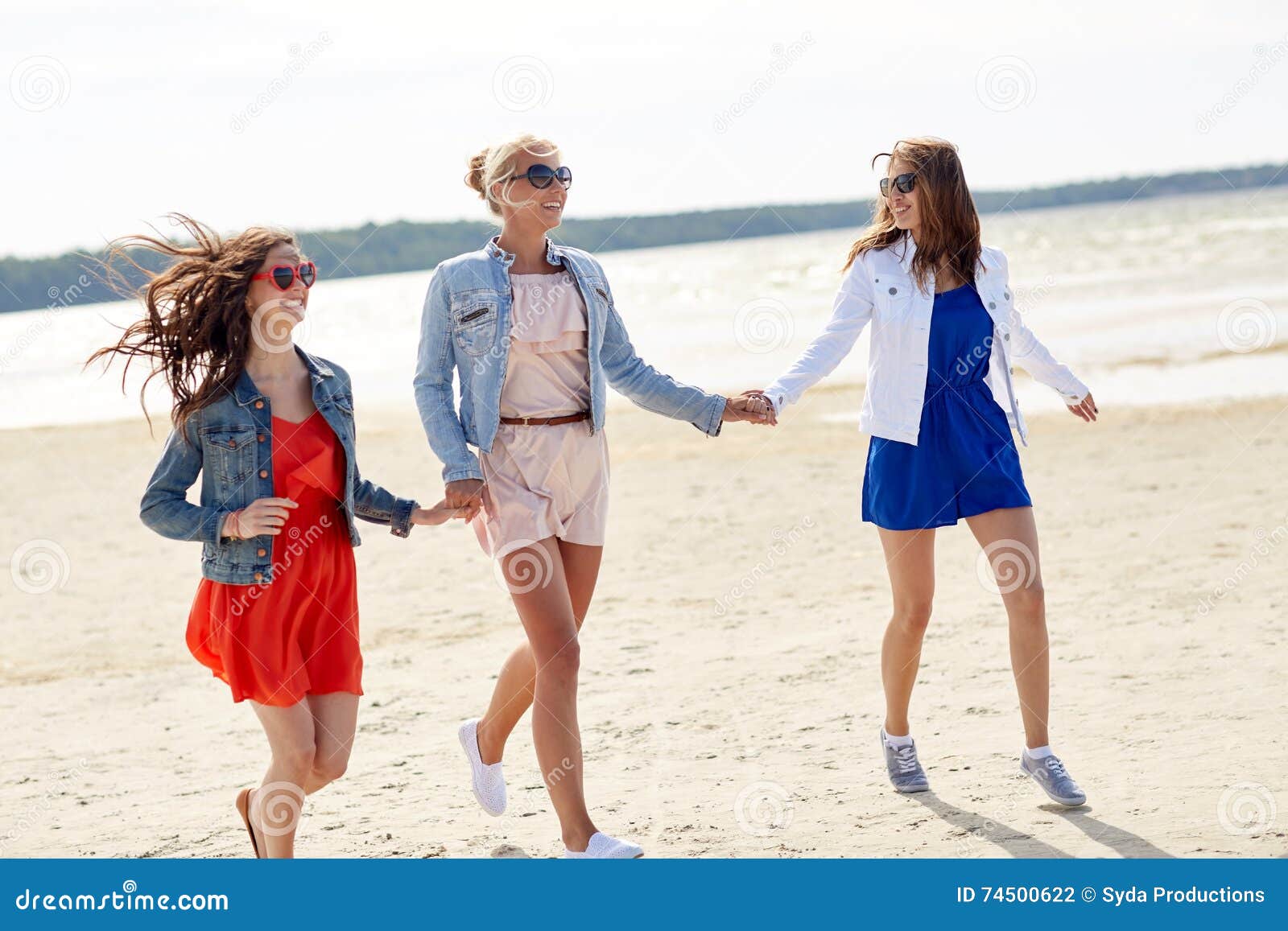 Group of Smiling Women in Sunglasses on Beach Stock Photo - Image of ...