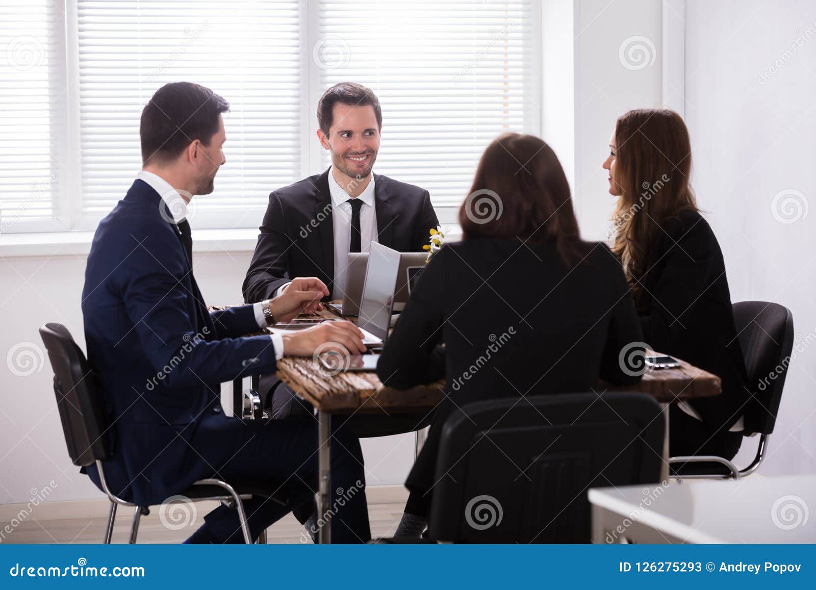 Businesspeople Attending Meeting in Office Stock Image Image of attending, male 126275293