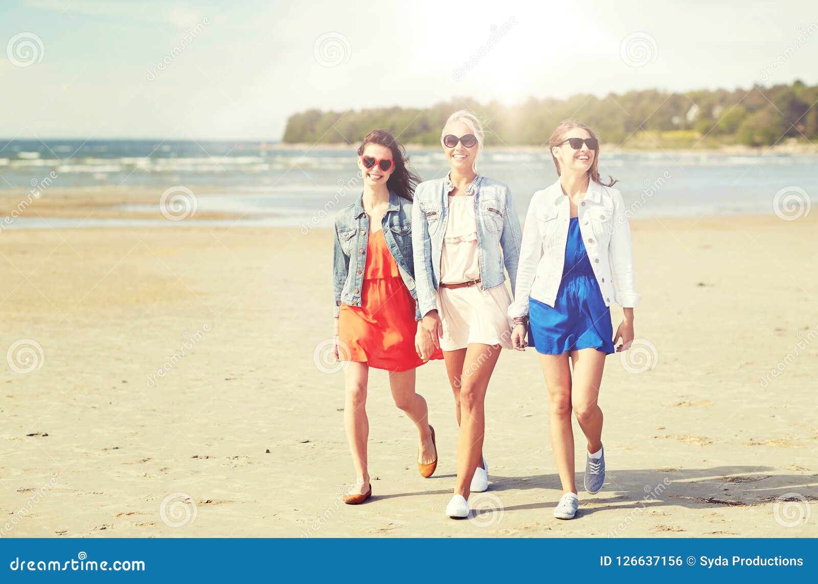 Group of Smiling Young Female Friends on Beach Stock Photo - Image of ...