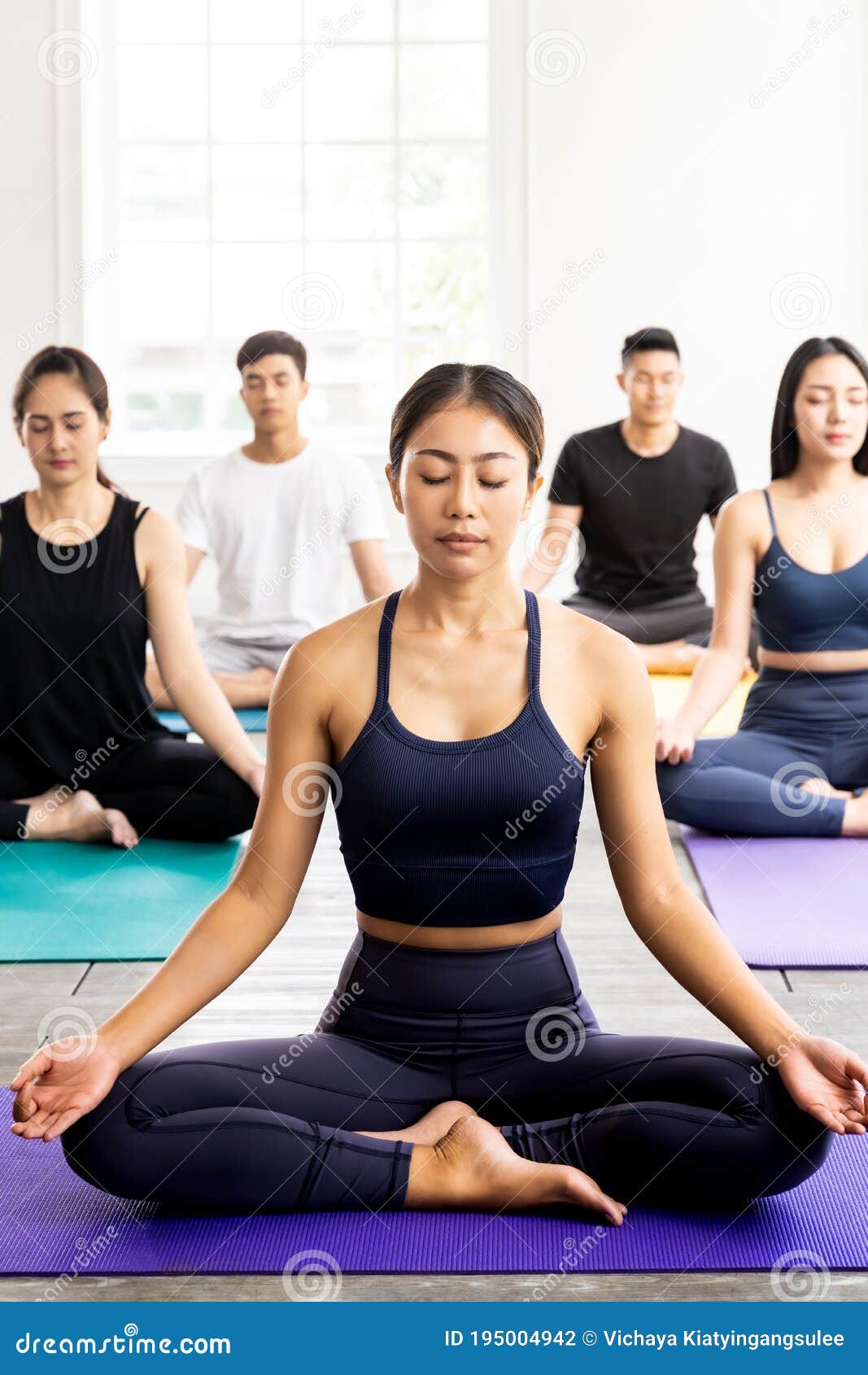 Smart Young Man Doing Yoga In Lotus Position Stock Photo - Download Image  Now - Adult, Asia, Asian and Indian Ethnicities - iStock