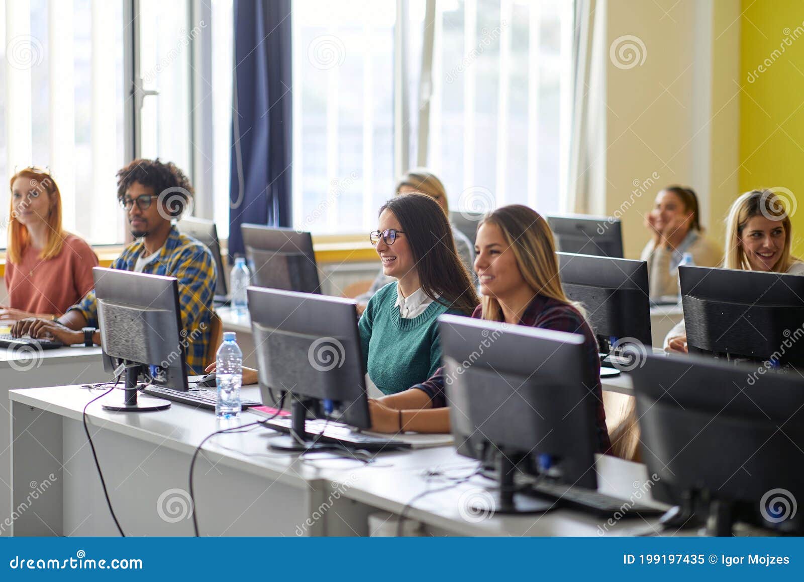 group of students at an informatics lecture. smart young people study at the college. education, college, university, learning and