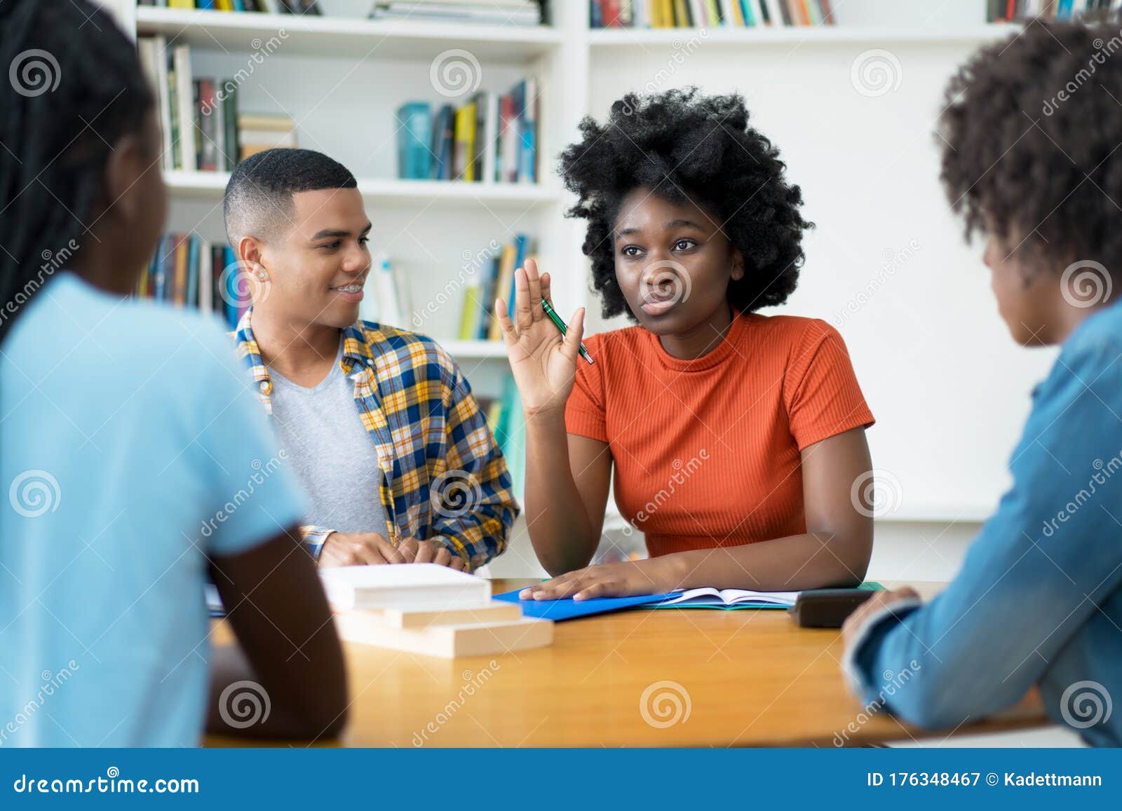 group of talking brazilian and african american students