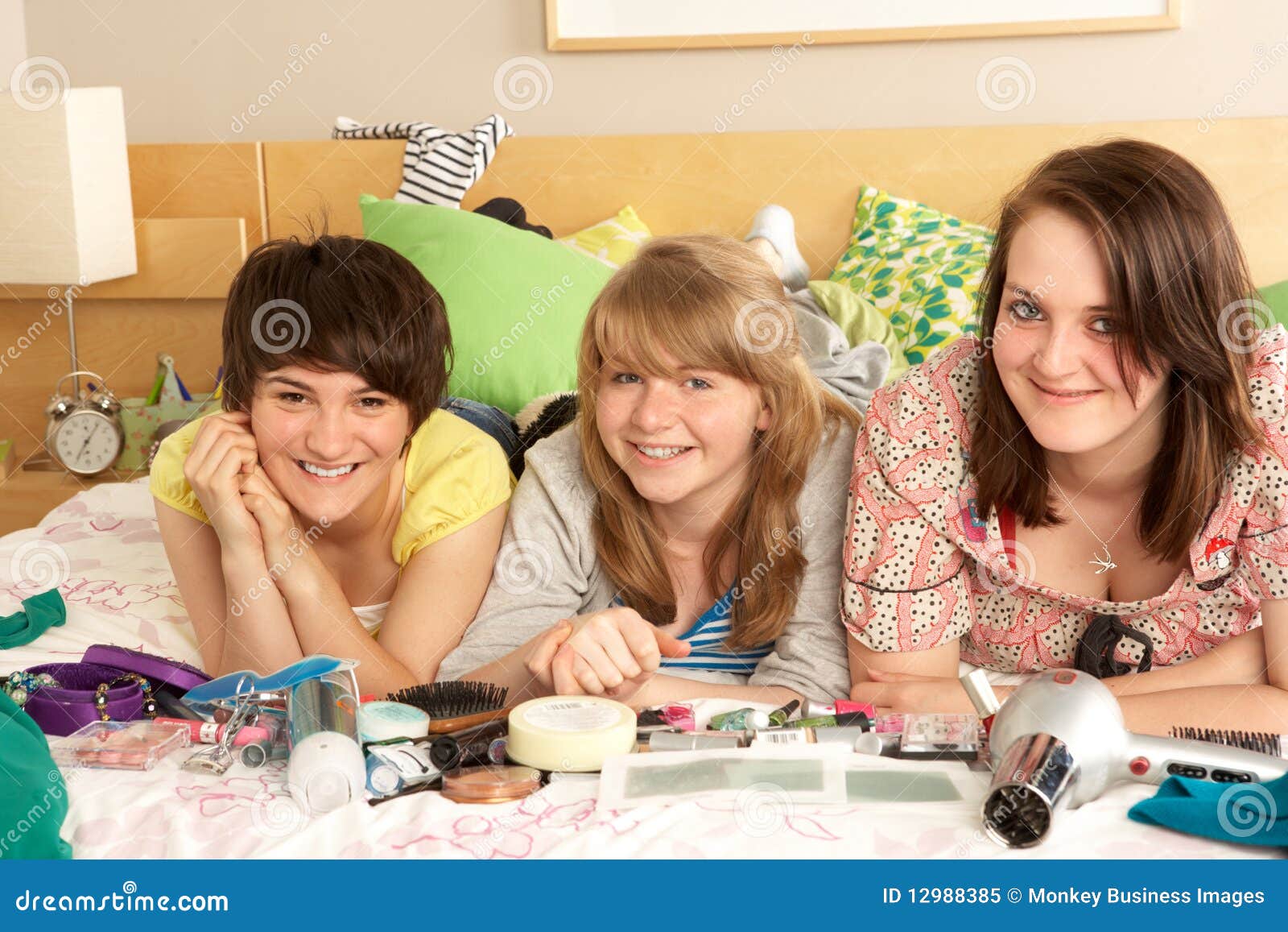 group of teenage girls in untidy bedroom
