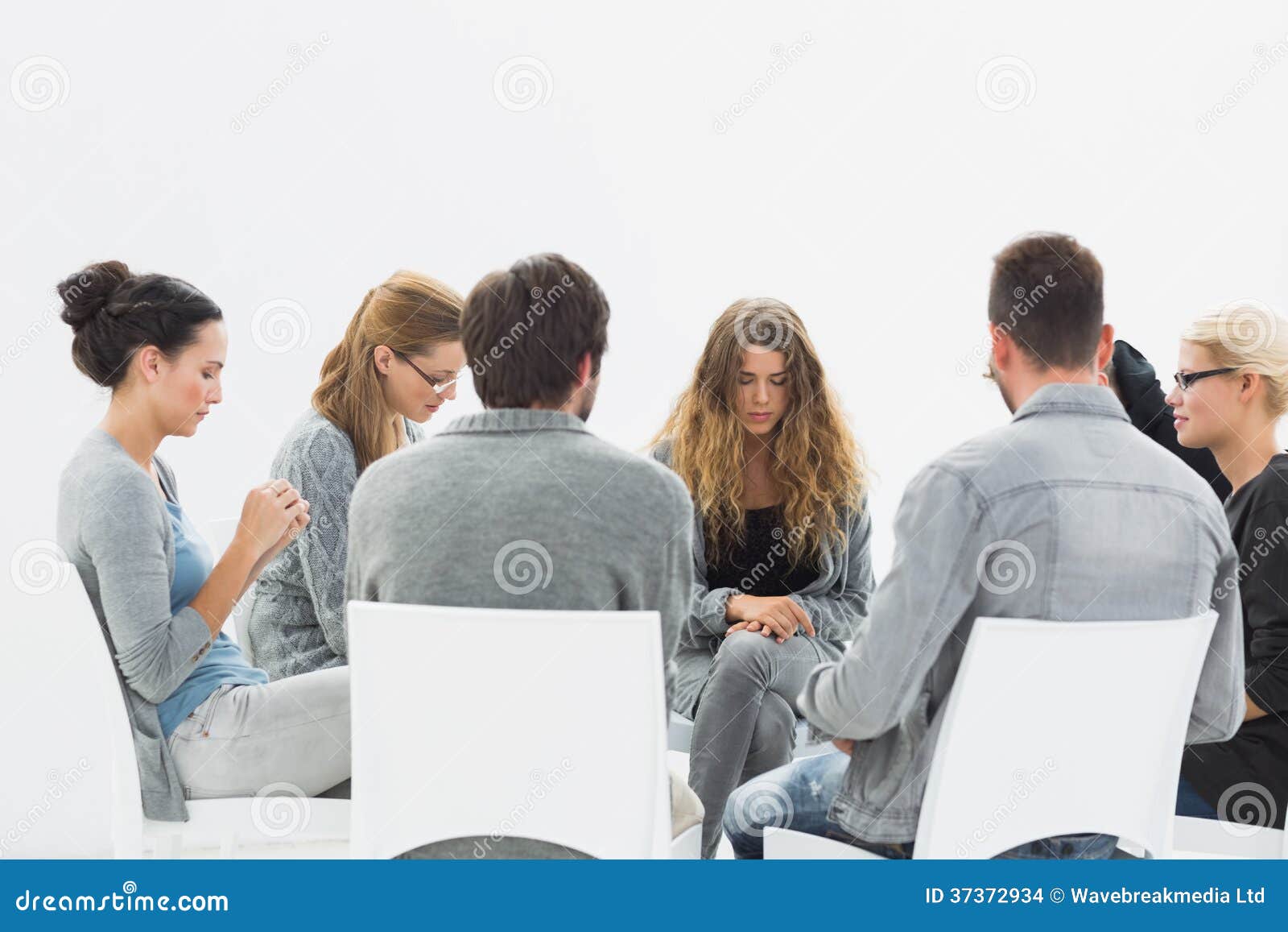 Group Therapy in Session Sitting in a Circle Stock Photo Image of