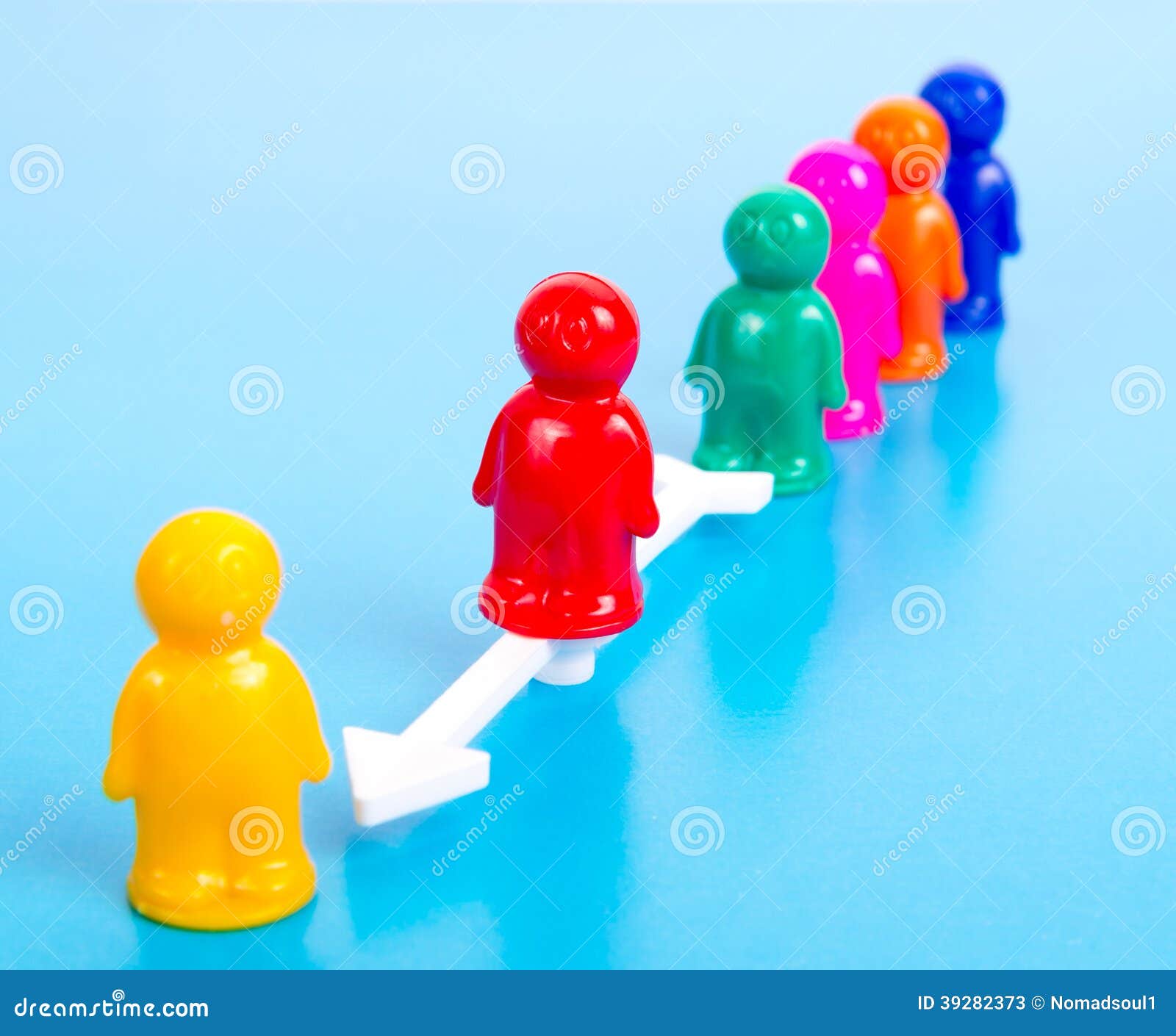 Group of Toy People and Direction Arrow Stock Image Image of gang