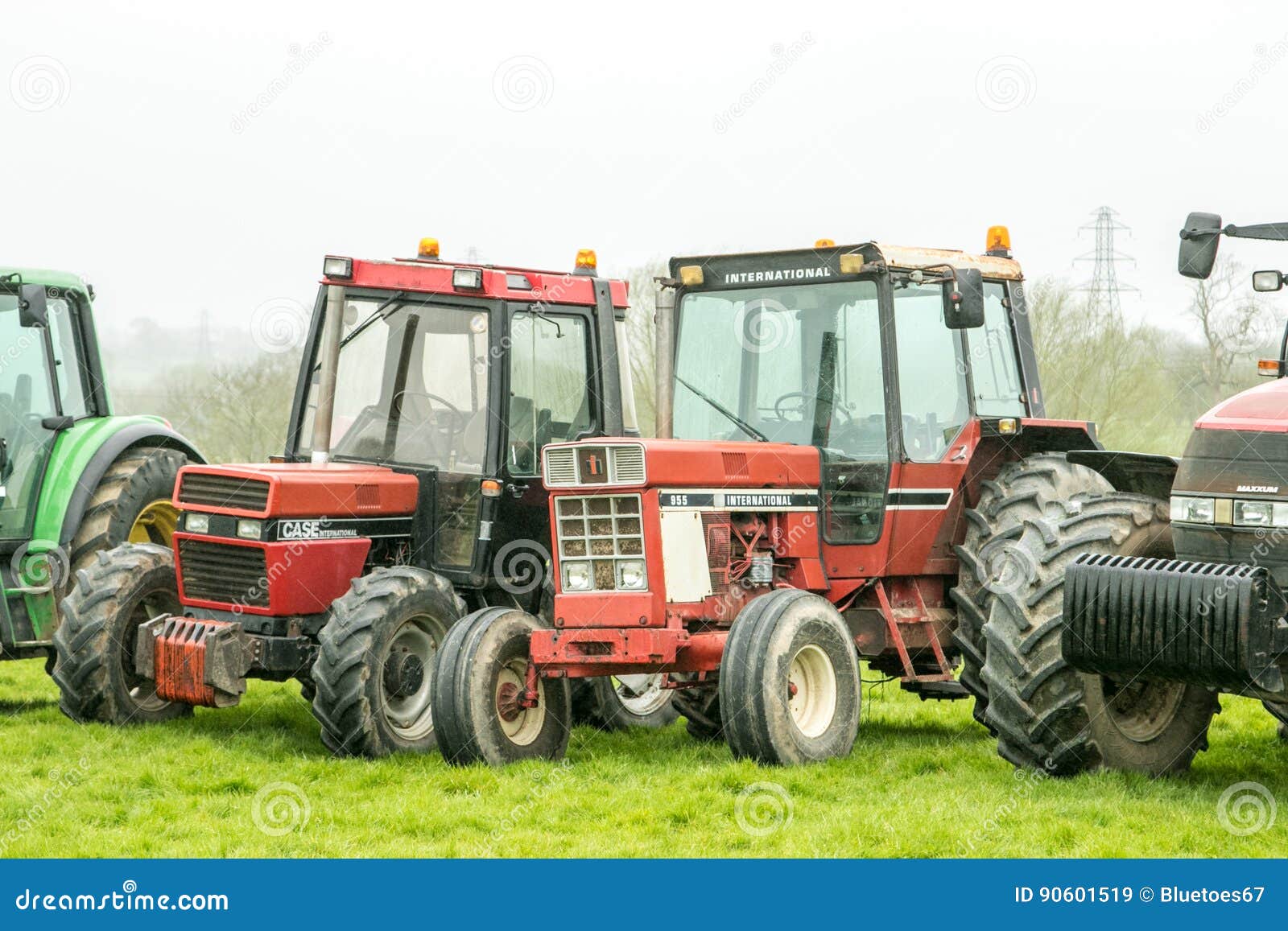 A Group of Tractors Parked Up Editorial Stock Image Image of group
