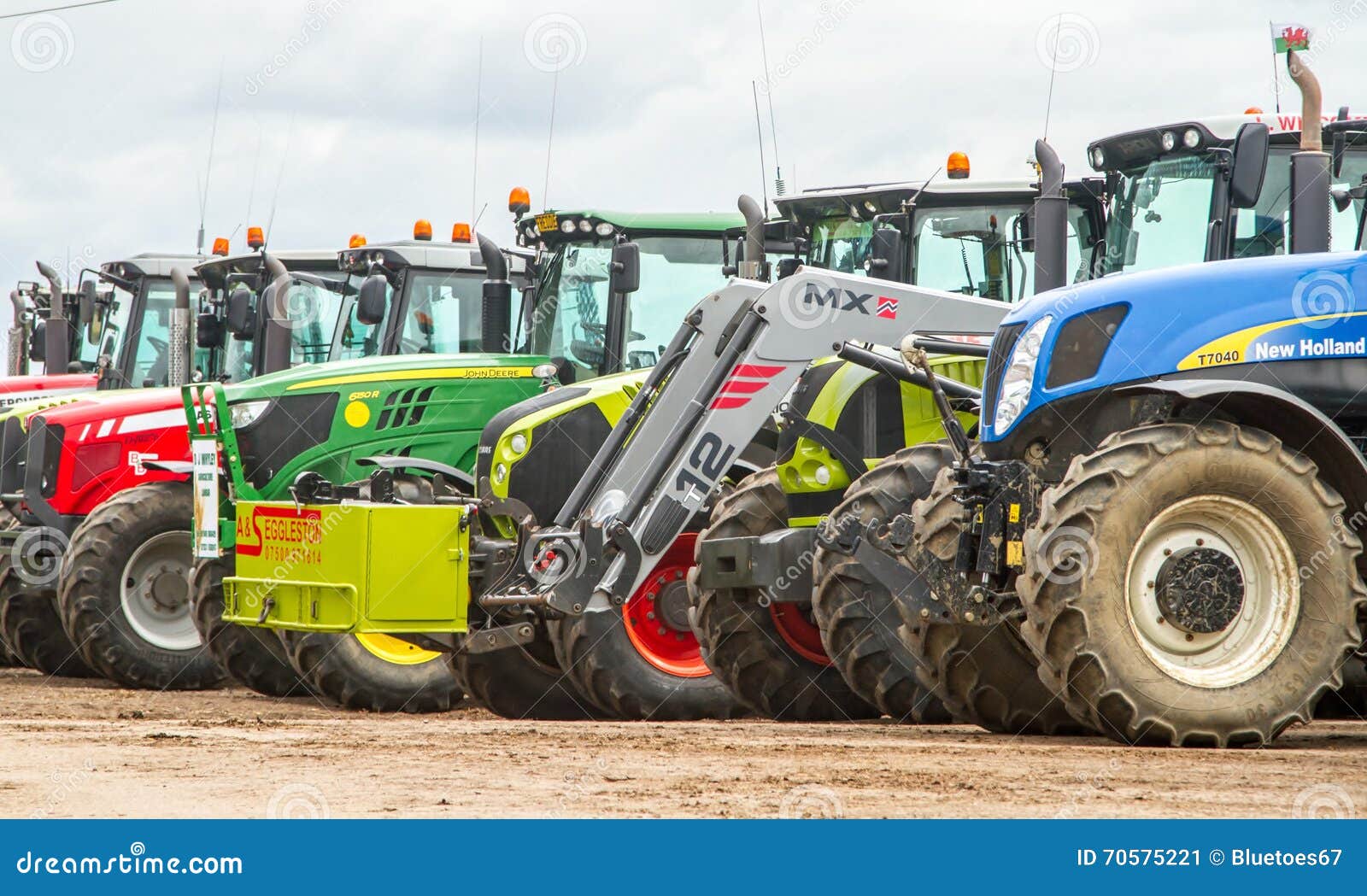 A Group of Tractors Parked Up Editorial Photo Image of bulldozer